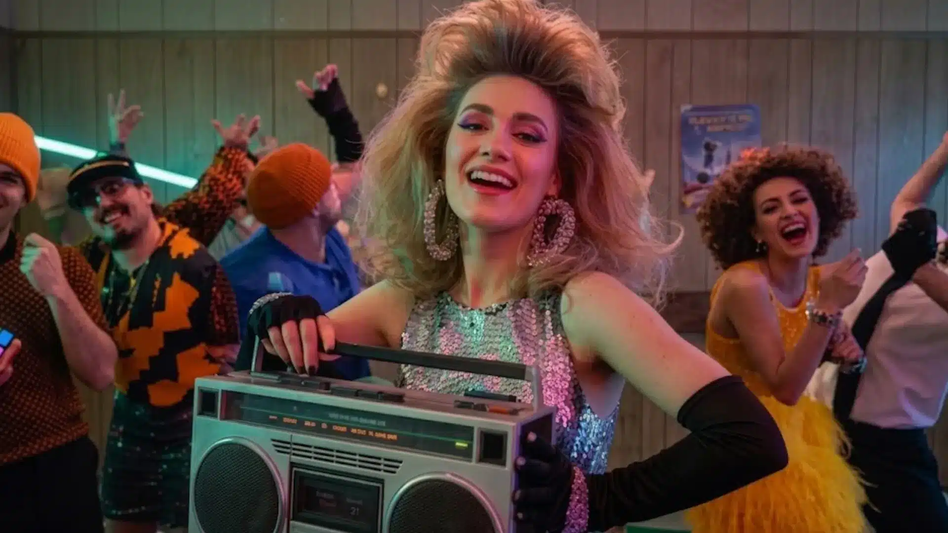 Group in retro outfits dancing with boombox and Rubik cubes in colorful 80s themed party setting indoors