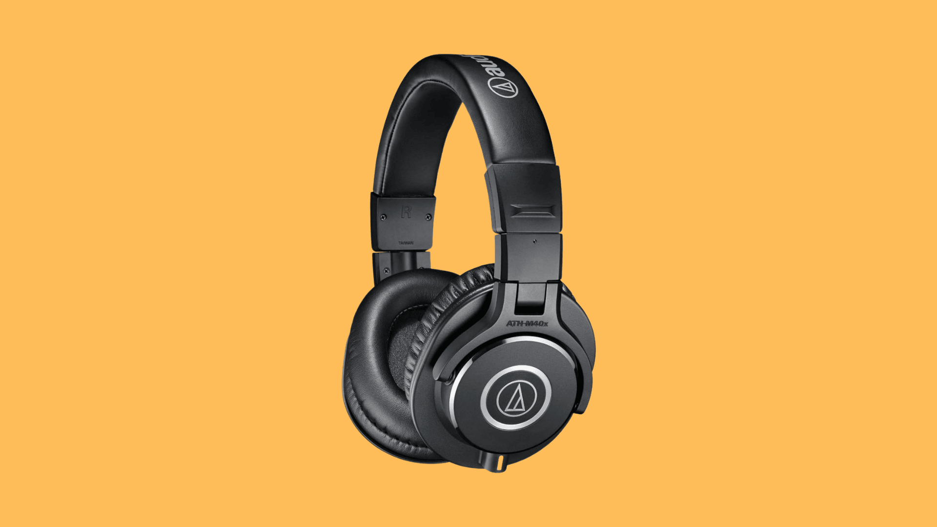 Audio-Technica ATH-M40x closed-back studio headphones with padded ear cups, foldable design, wired cable, and balanced monitoring sound
