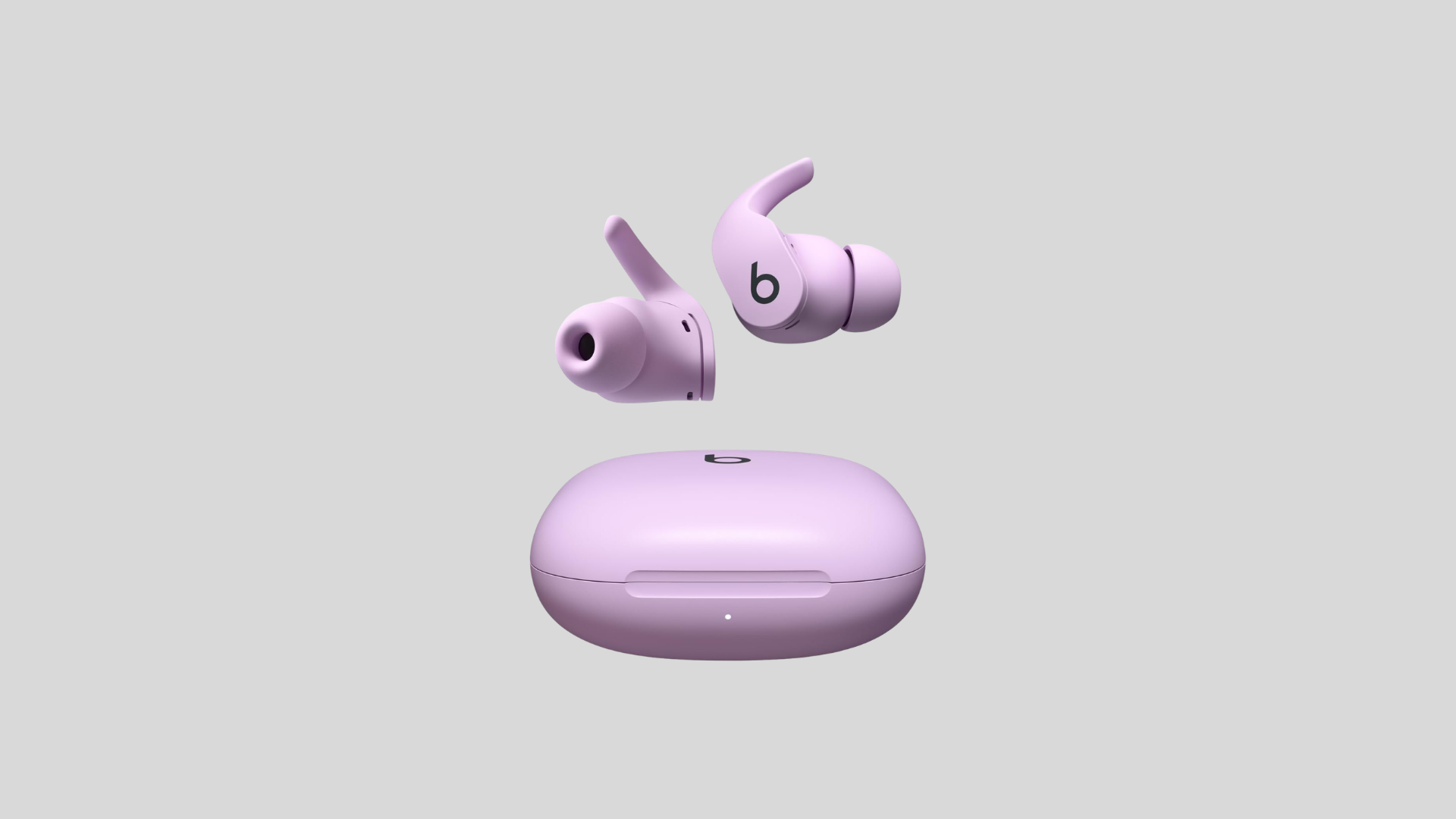 Beats fit pro purple wireless earbuds with wing tips and charging case shown below highlighting sporty design and secure fit