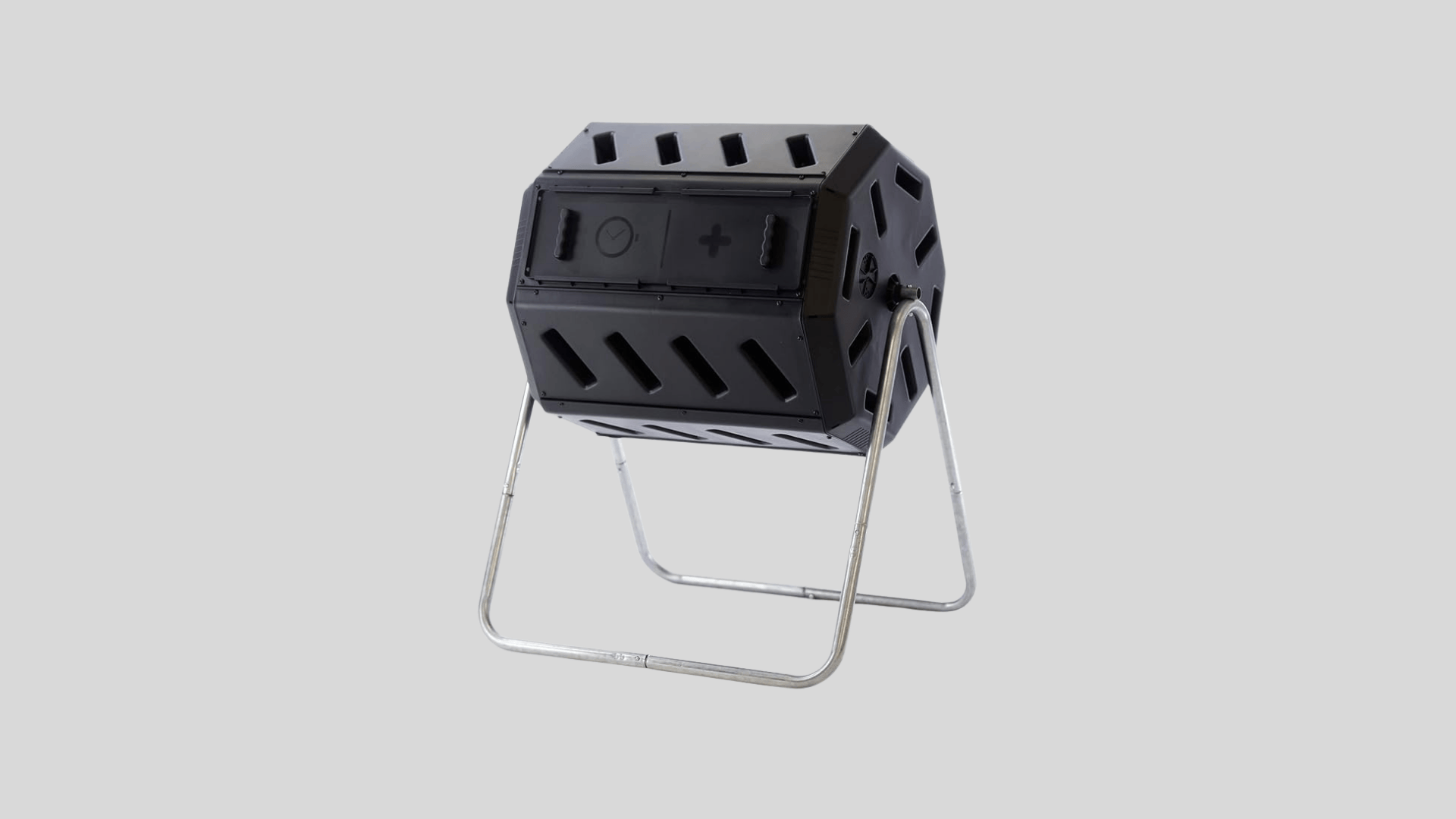 Black compost tumbler bin with dual chambers and ventilation slots mounted on metal frame for easy rotation