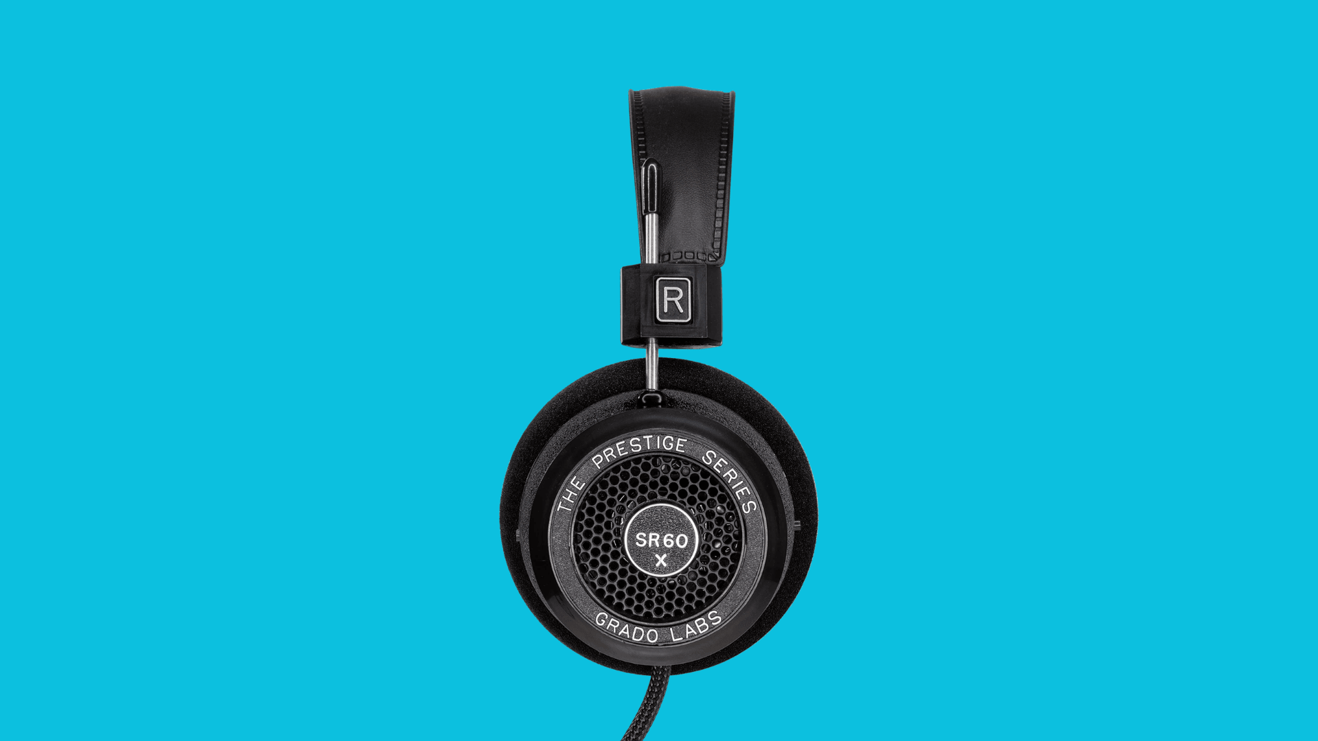 Grado SR60x open-back on-ear headphones with foam ear pads, metal headband, wired cable, and lively detailed sound