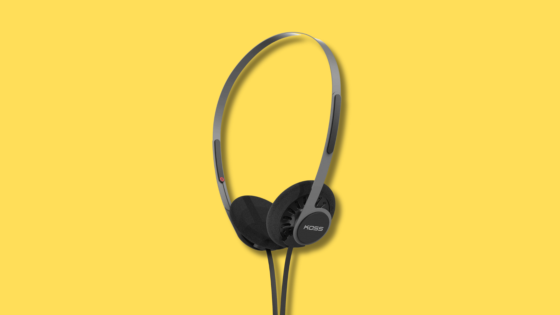Koss KPH40 Utility on-ear open-back headphones with foam ear pads, lightweight metal headband, and wired cable in gray finish