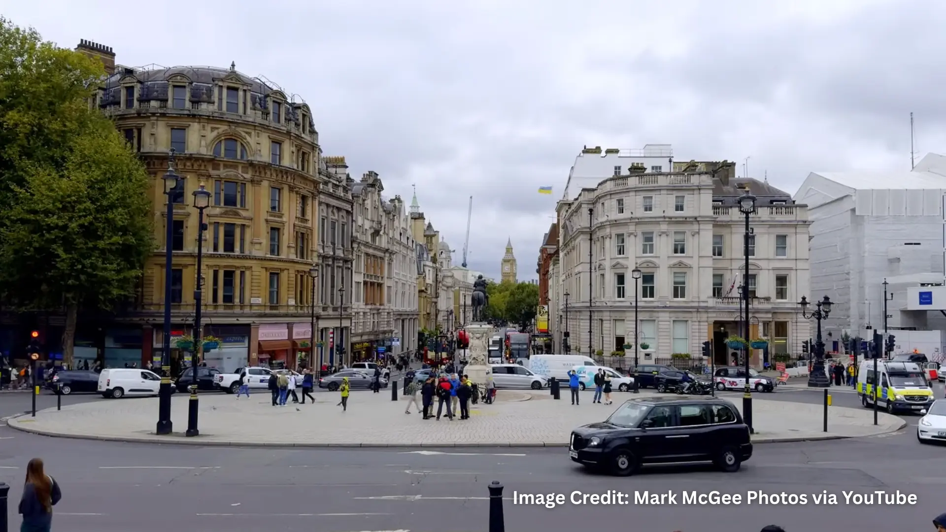 London street near Trafalgar Square with historic buildings and Big Ben using Telephoto Zoom on iPhone 16 Pro Max Camera
