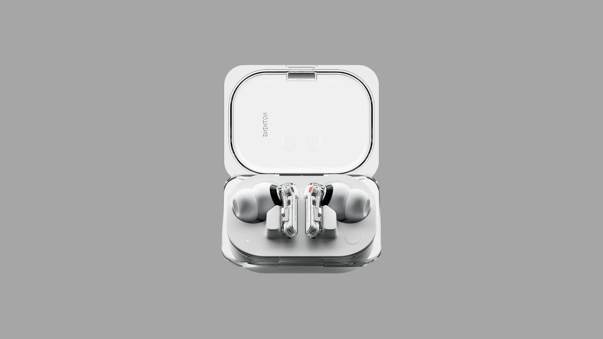 Nothing ear wireless earbuds with transparent stem design placed inside a clear charging case showing modern minimalist earbuds style