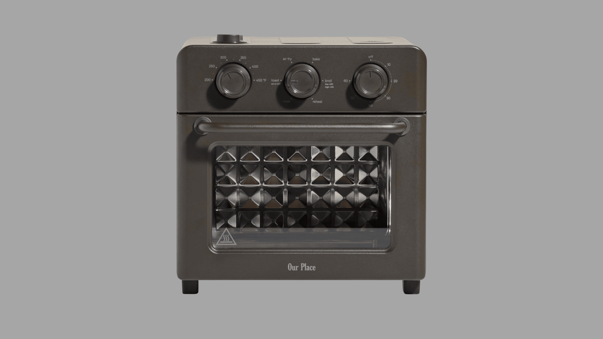 Our Place countertop air fryer oven with bake toast broil settings and glass door for compact kitchen cooking