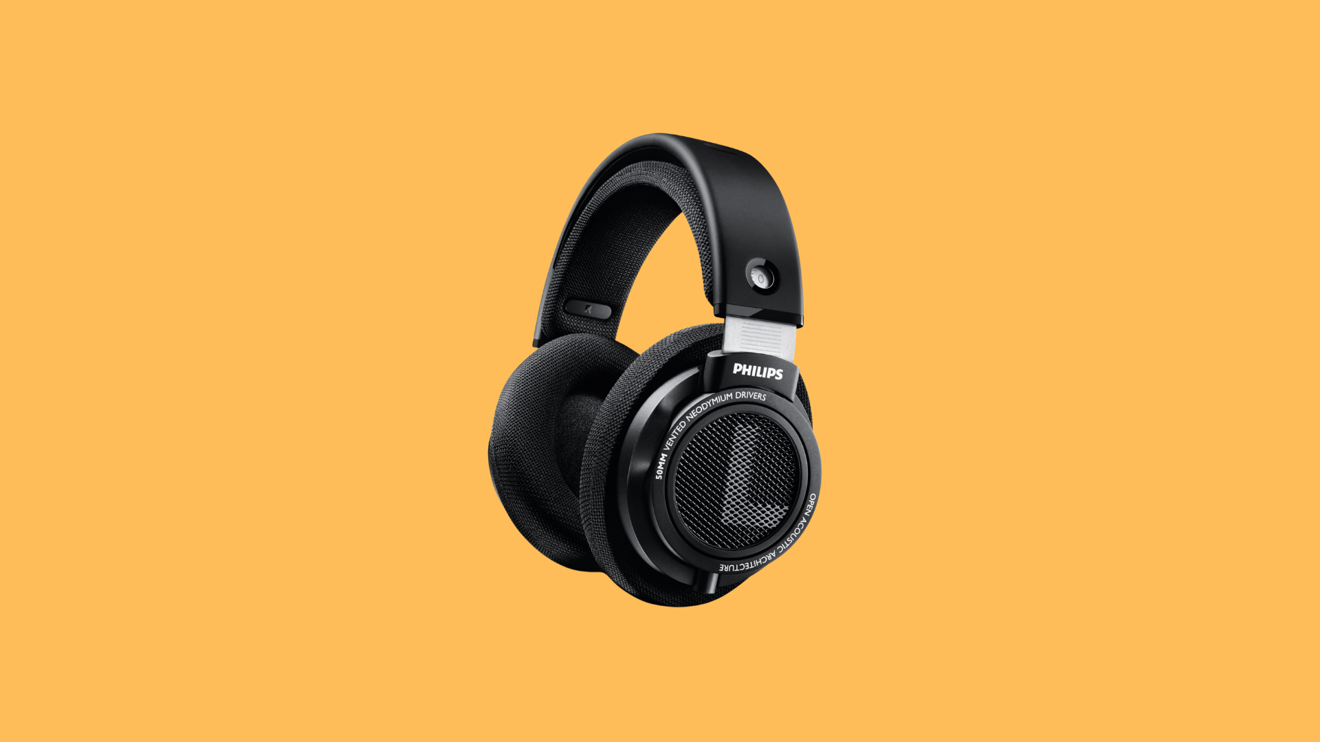 Philips SHP9500 open-back over-ear headphones with breathable fabric ear pads, adjustable headband, and wide soundstage design
