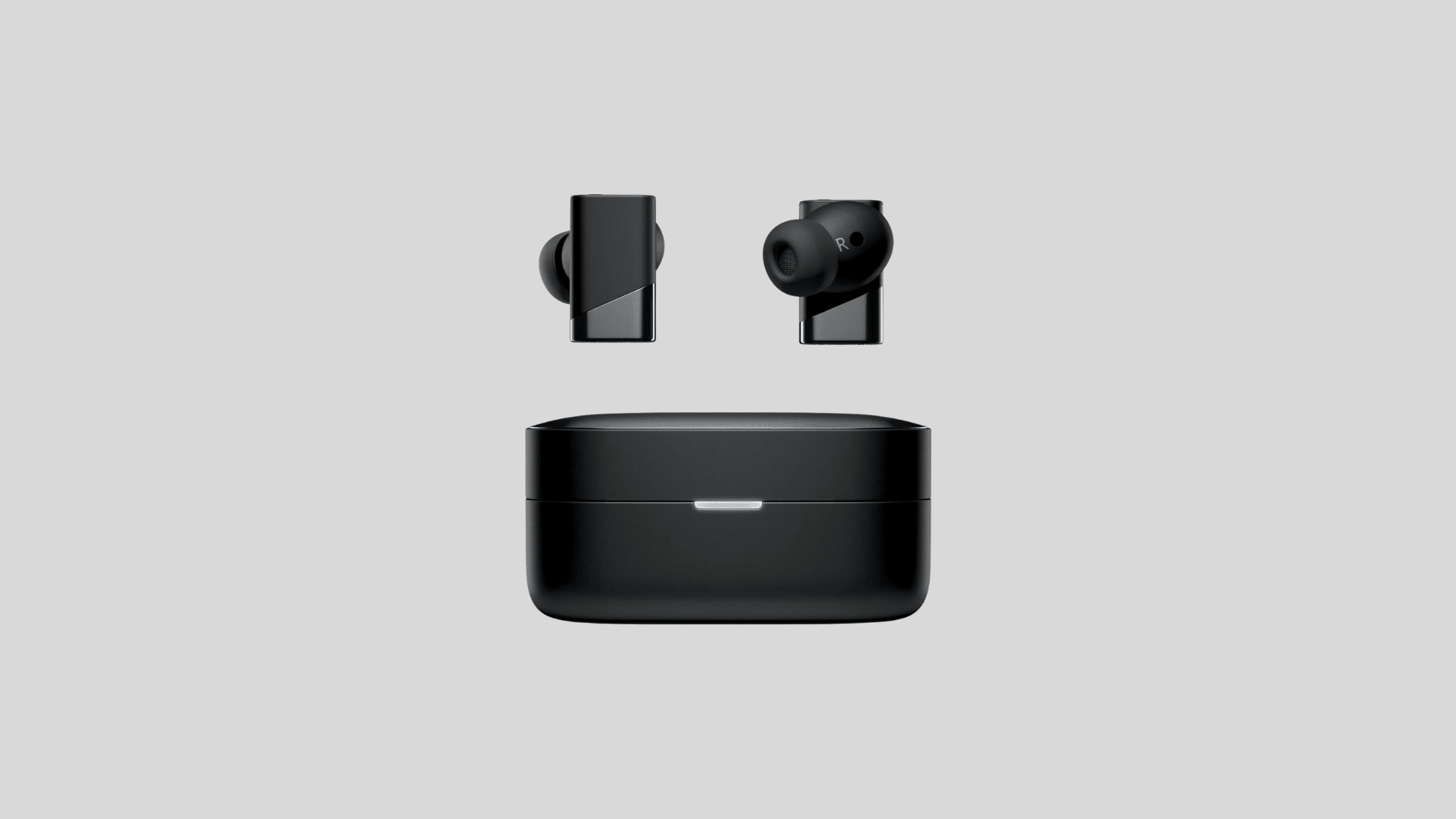 Status Pro X wireless earbuds and charging case in matte black showing stem design and silicone ear tips