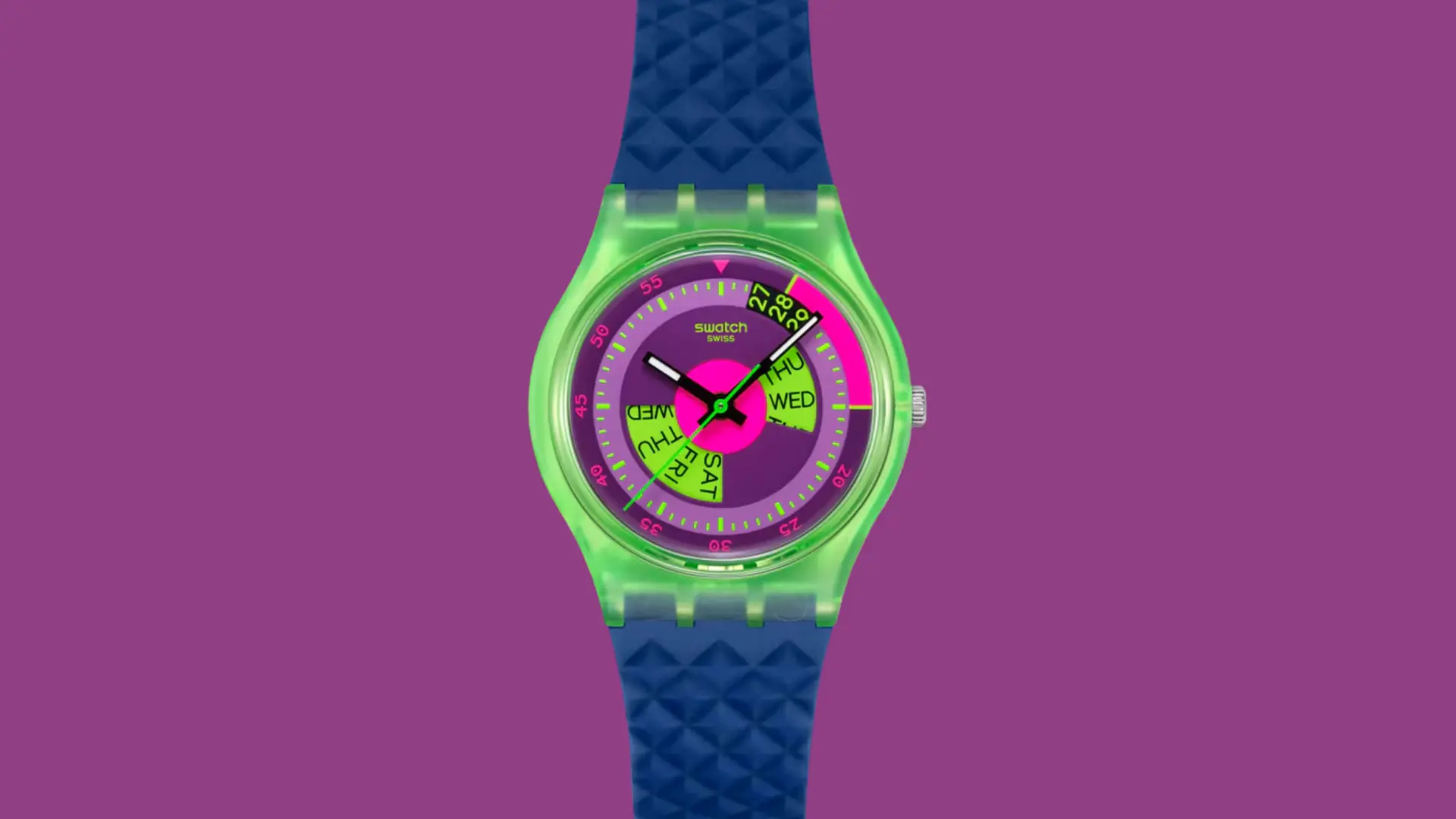 Swatch colorful watch with neon green case, purple dial, and blue strap on a bright purple background