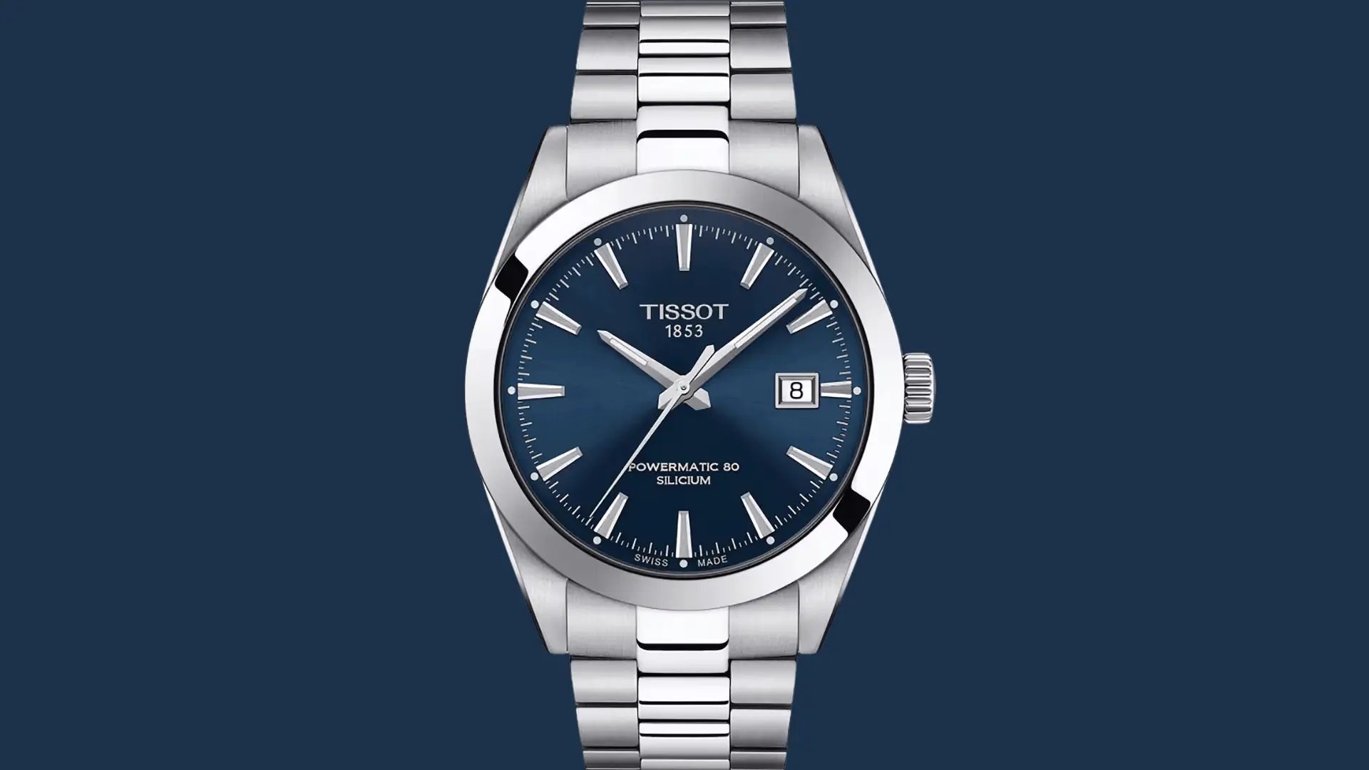 Tissot stainless steel watch with blue dial and date display showcased on a dark blue background