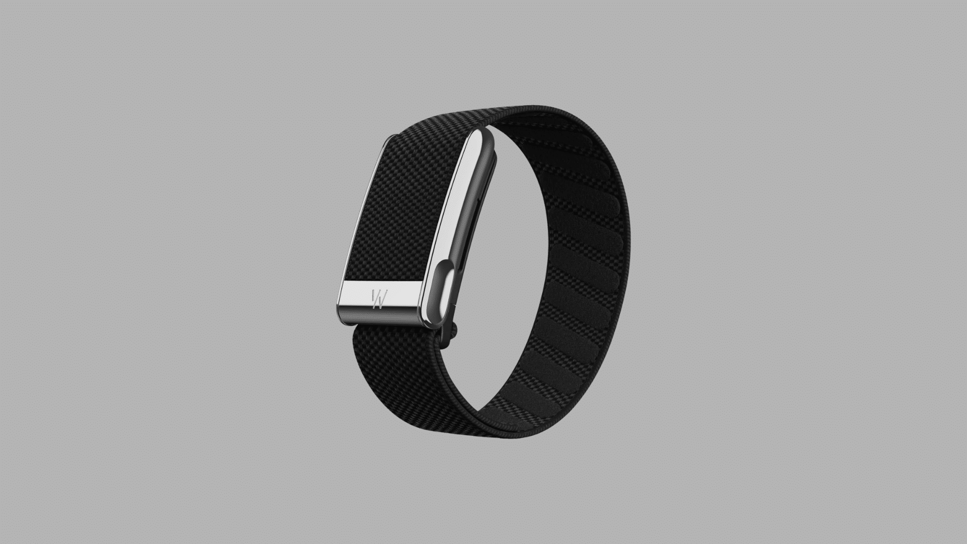 WHOOP fitness band with black strap and polished sensor module designed for recovery, sleep tracking, and strain monitoring