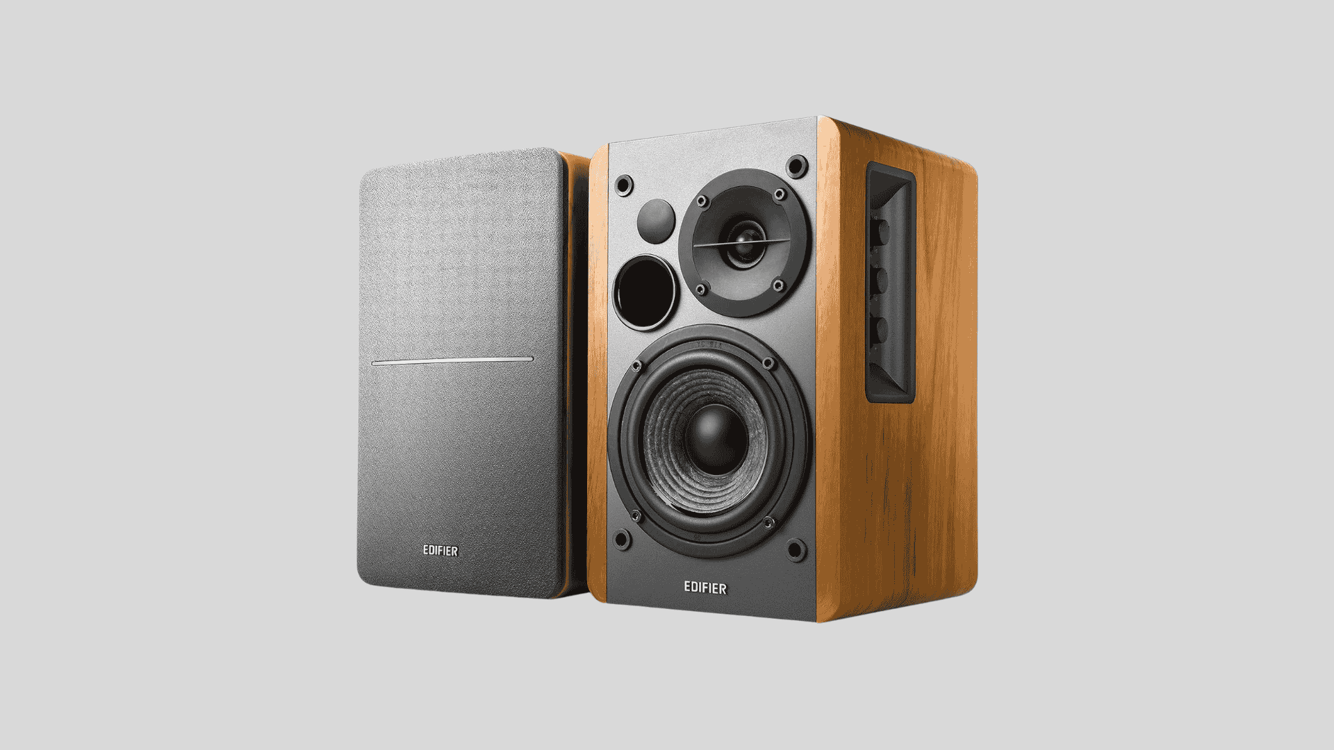 Edifier R1280DB powered bookshelf speakers with wood finish and front facing drivers for clear and balanced room audio
