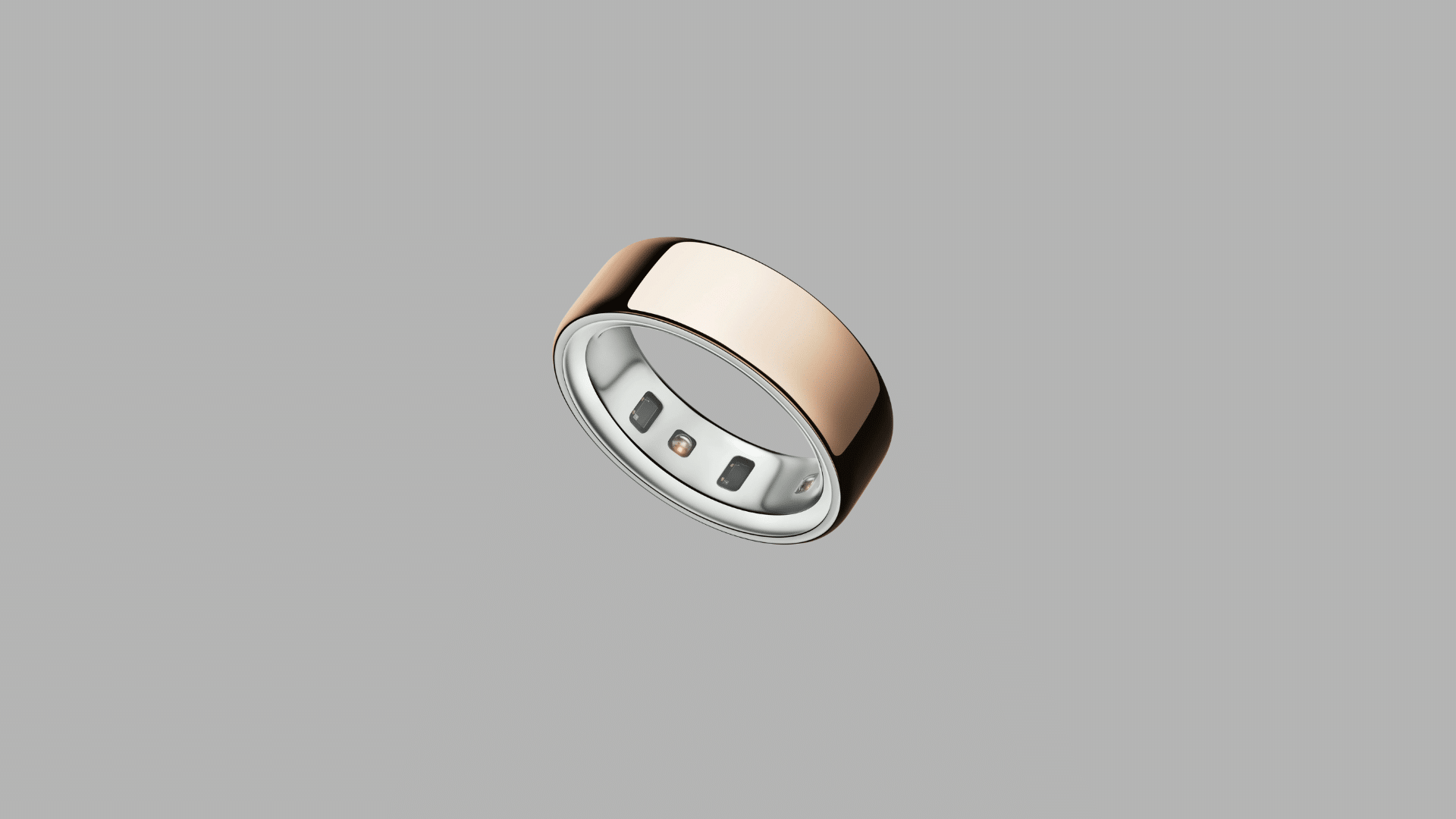 Oura Ring 4 in gold finish showing inner sensors and sleek design for health and sleep tracking