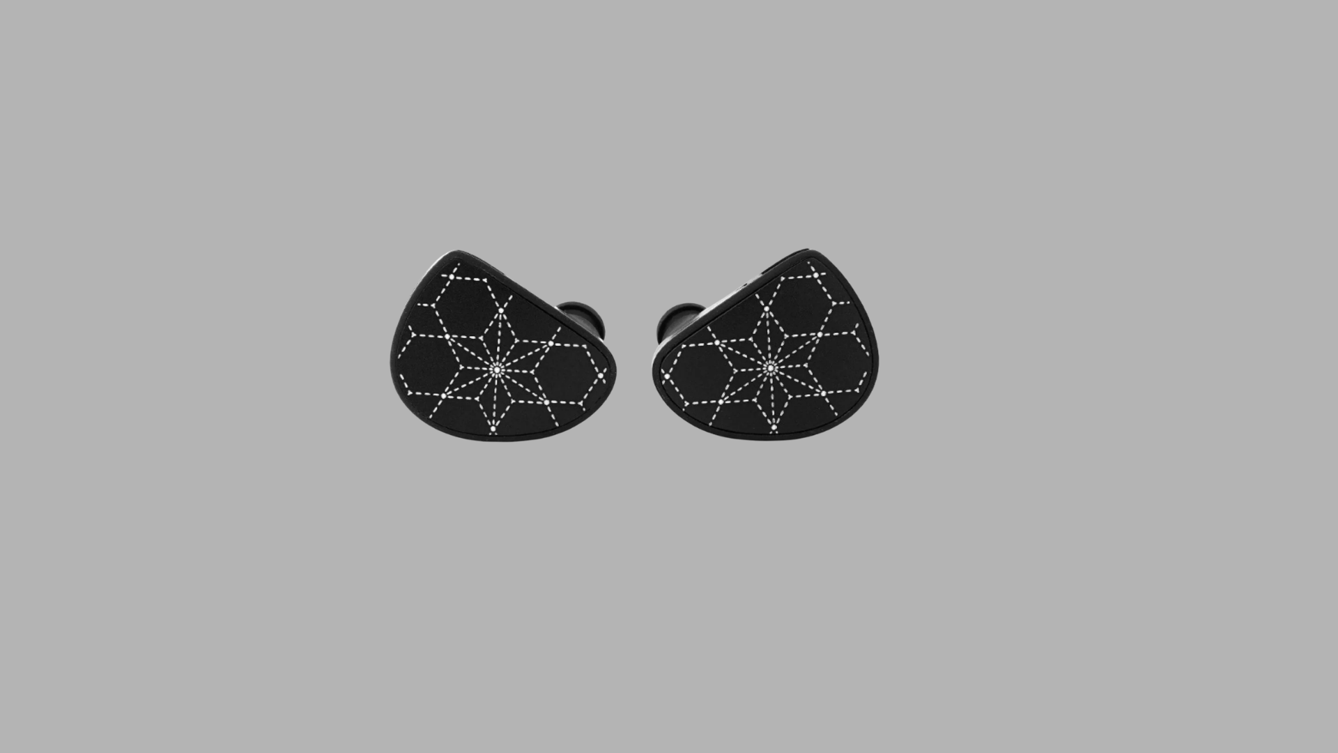 Truthear Hola in-ear monitors with black shell and patterned faceplate design for warm and balanced sound