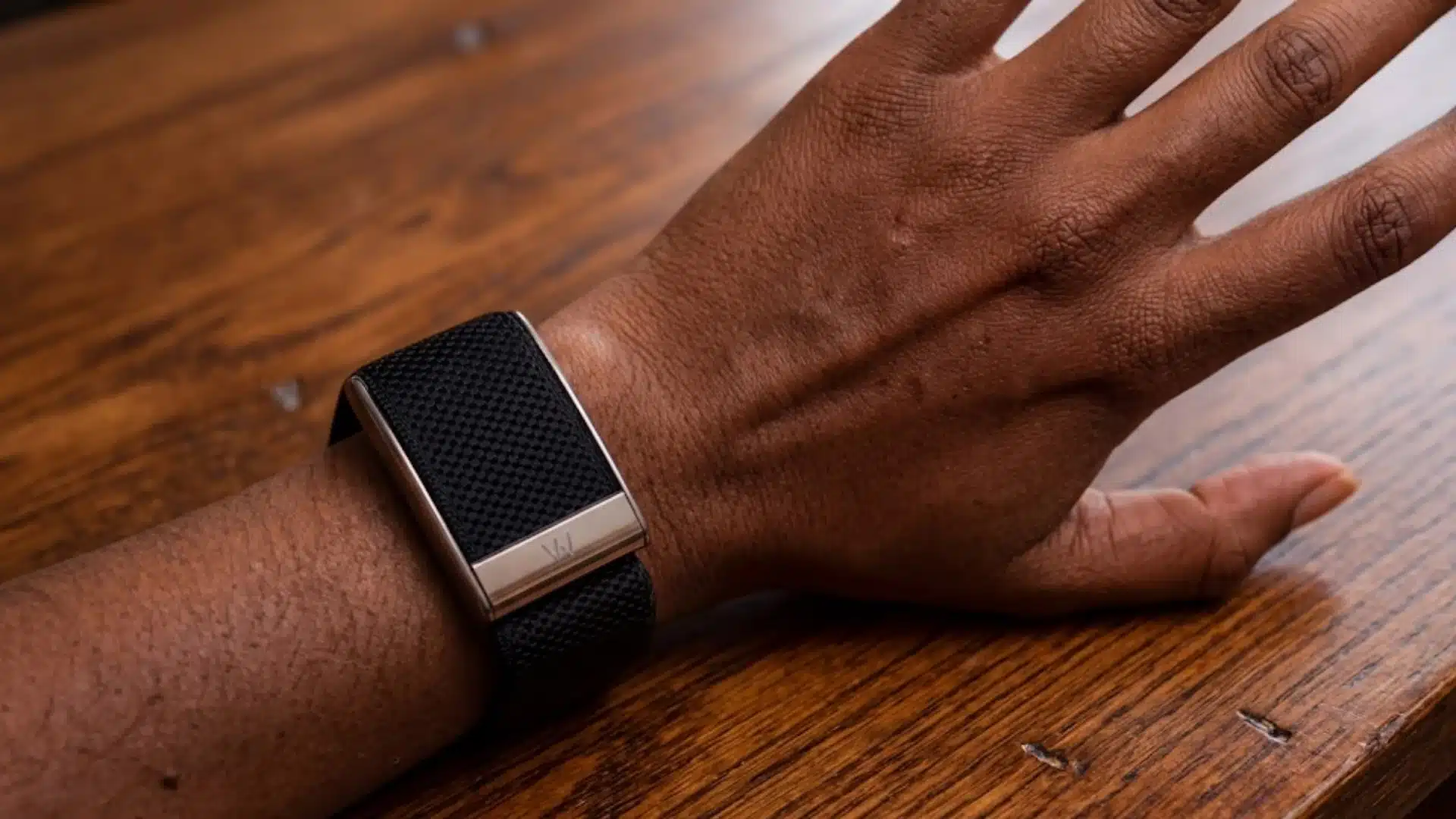 Whoop band worn on wrist showing real life fit, minimal design, and continuous health tracking during daily use