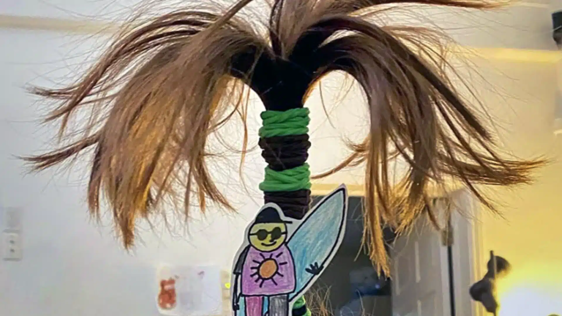 Creative spirit week hairstyle with colorful bands and playful decorations, showing school pride and individuality