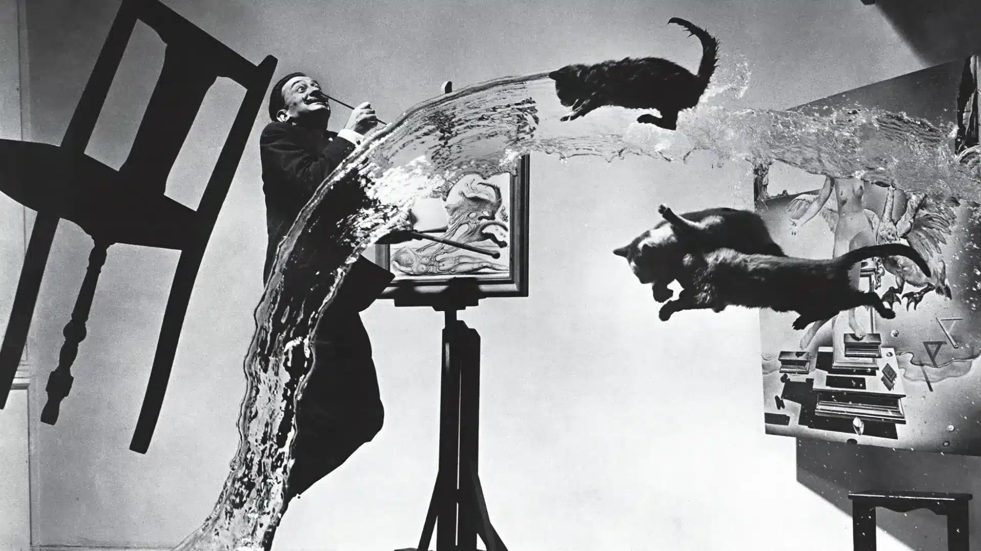 Salvador Dali scene with cats and water frozen mid air as chair and objects float in surreal composition