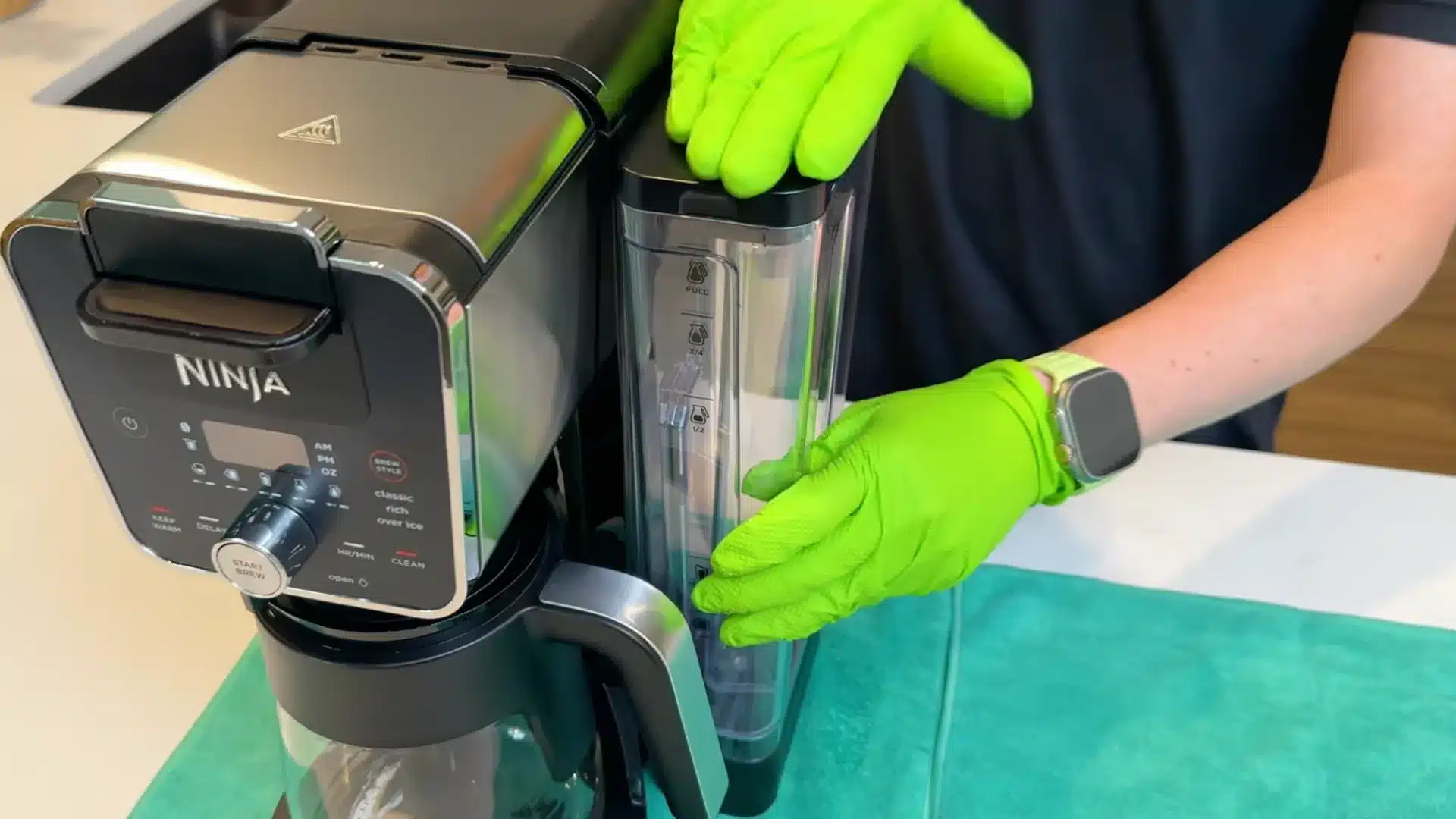 Clean coffee maker fully reassembled and ready to use after descaling and drying