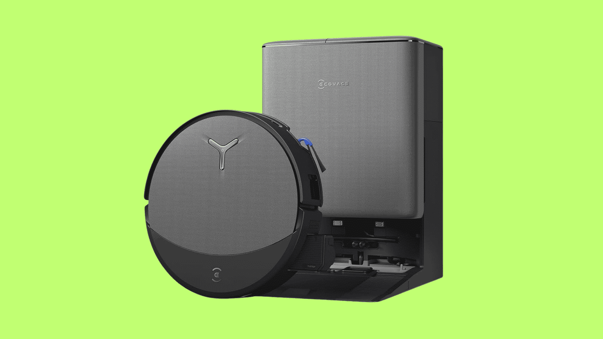 Ecovacs robot vacuum with gray docking station on a green background, showing a sleek modern cleaning system