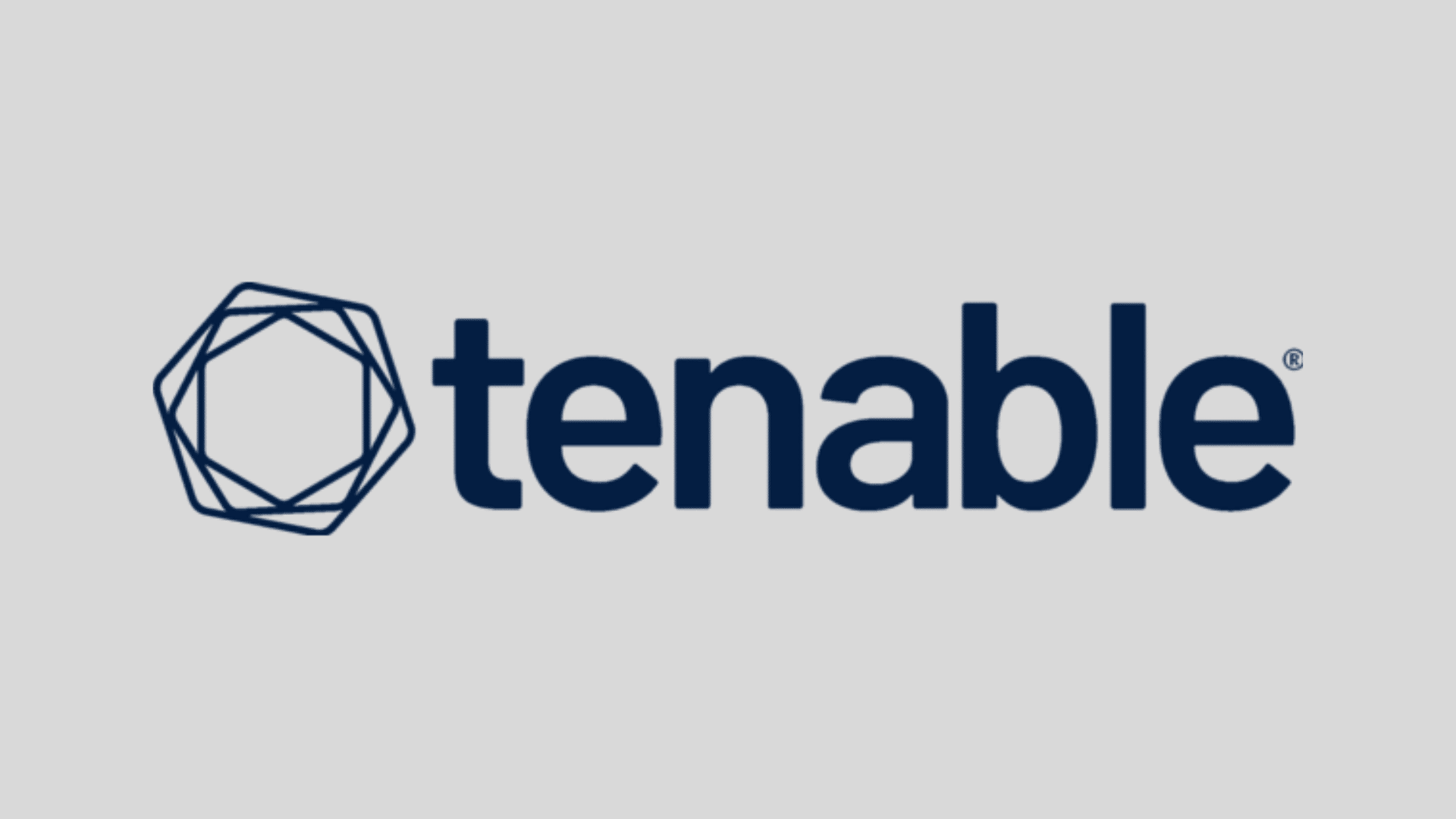 Tenable logo with a dark blue geometric hexagon icon on the left and dark blue text on a grey background
