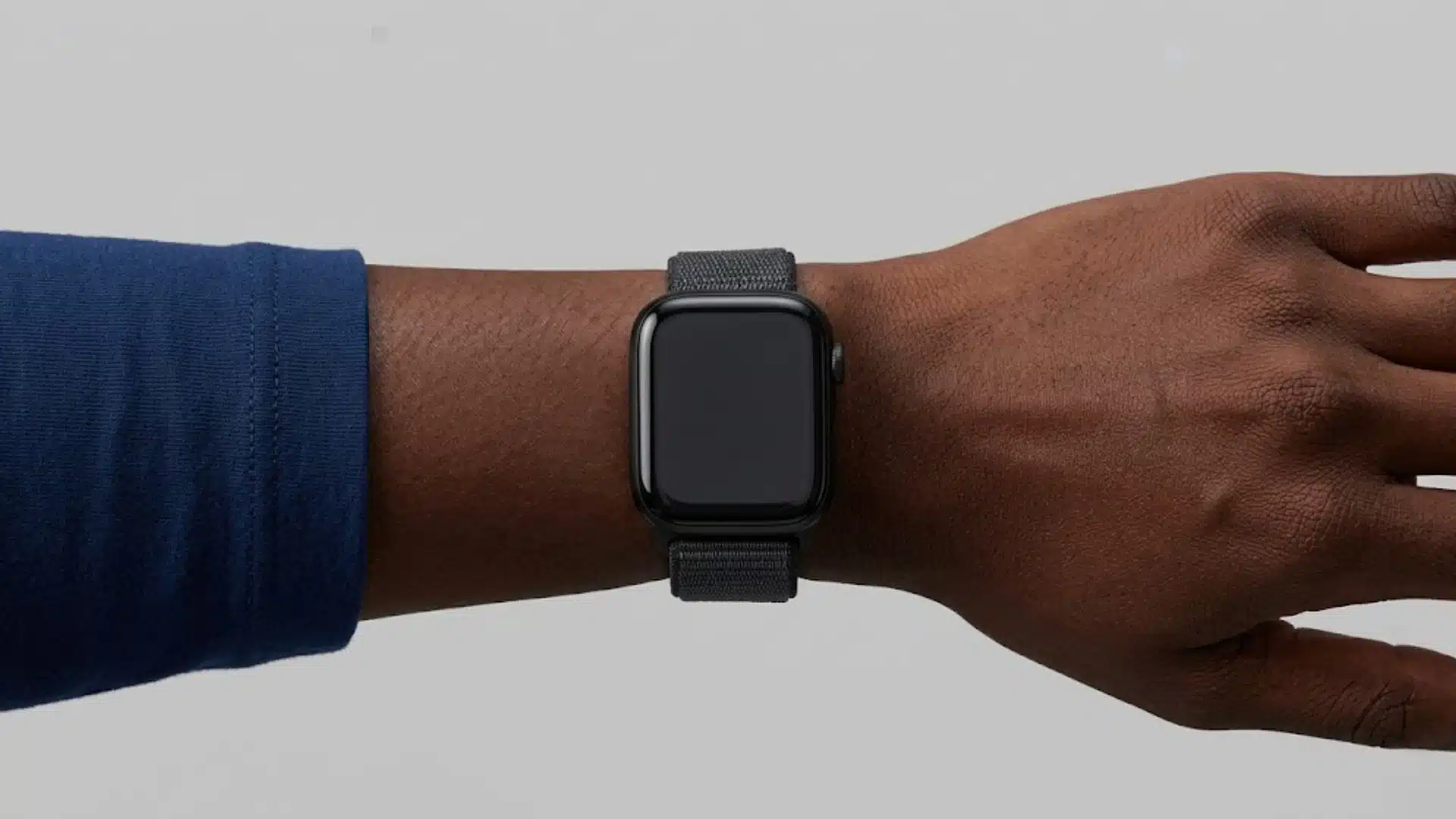 Apple Watch with black band on wrist showing clean design, snug fit, and minimal look for daily use
