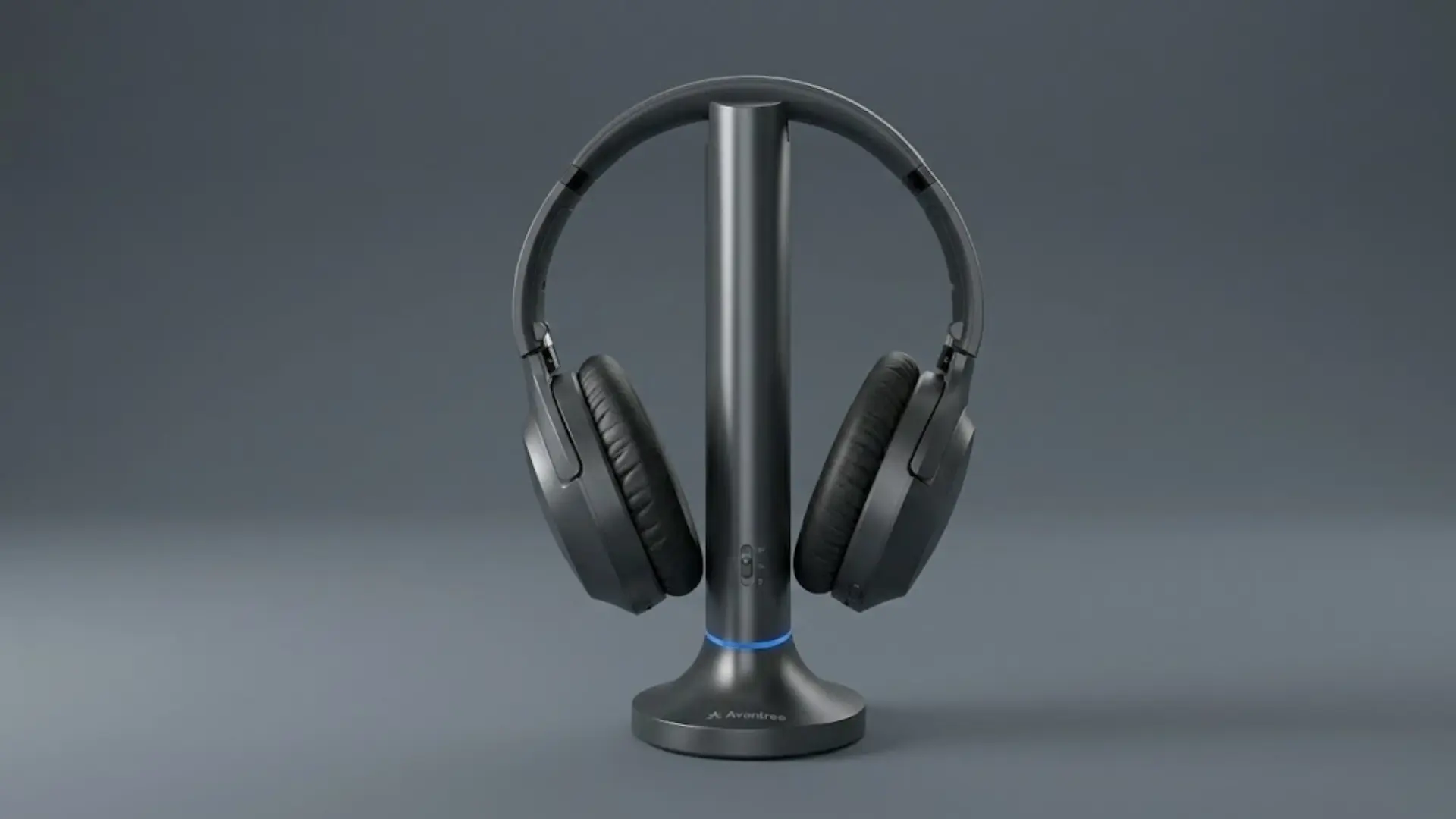 Avantree wireless TV headphones on charging stand with over ear design and clean gray background