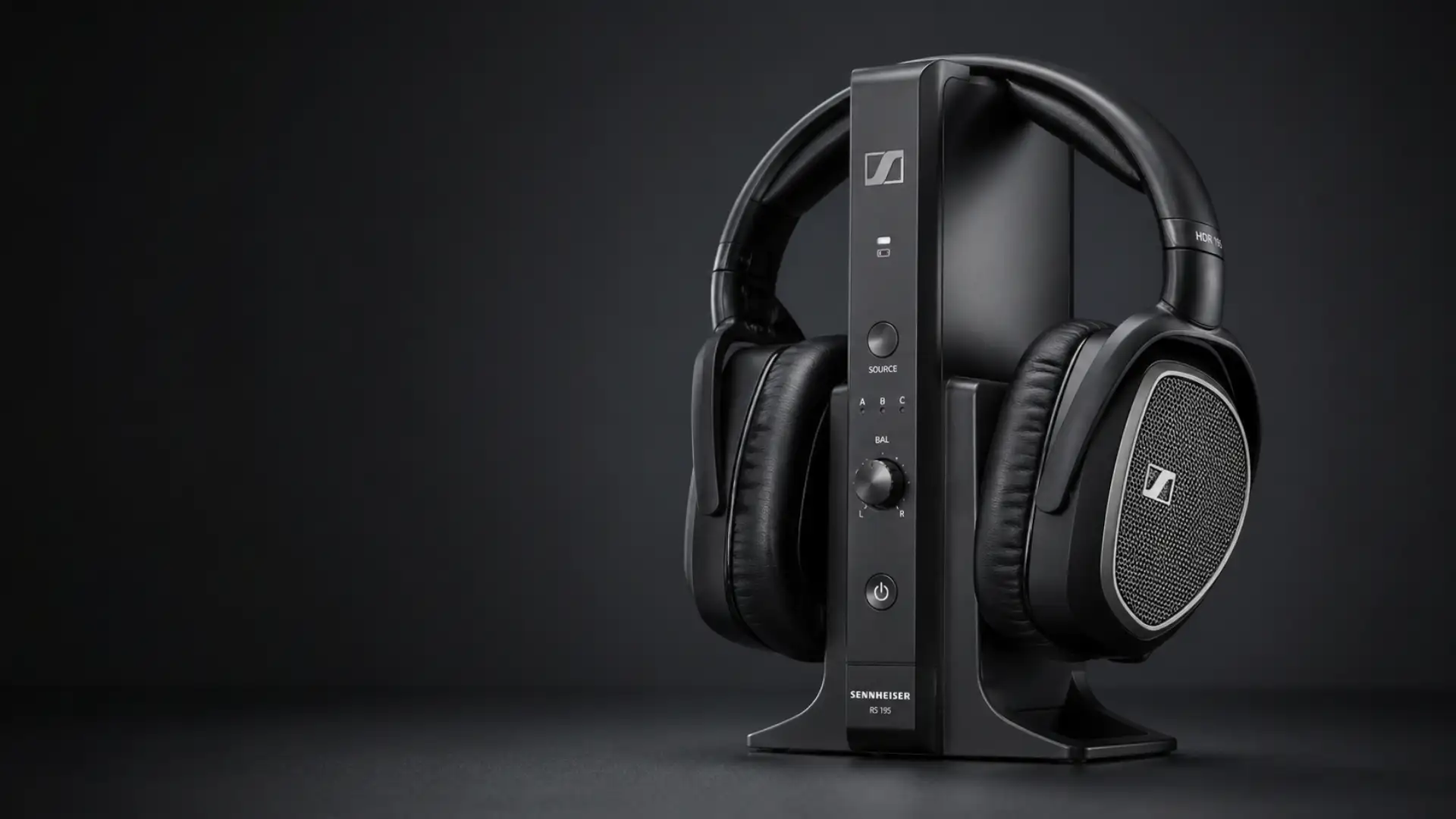 Sennheiser wireless headphones on charging stand with control panel, premium over ear audio setup