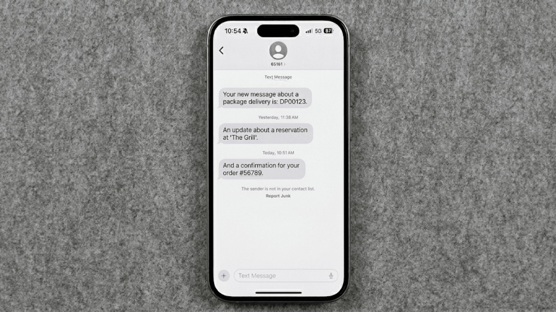smartphone displaying unknown text messages and suspicious spam notifications (1)