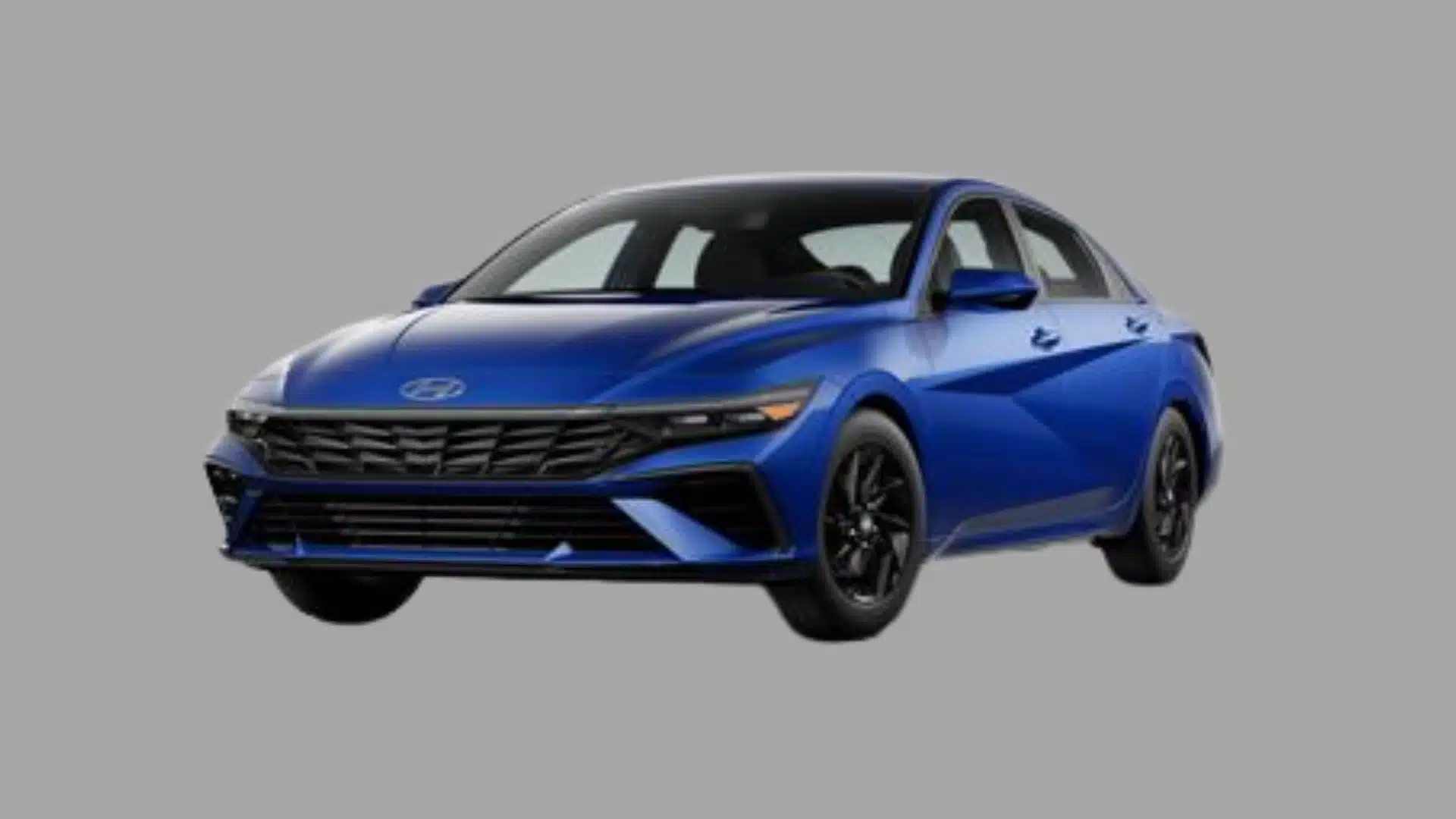 Blue Hyundai Elantra Hybrid sedan with sporty styling and black wheels on a plain gray background
