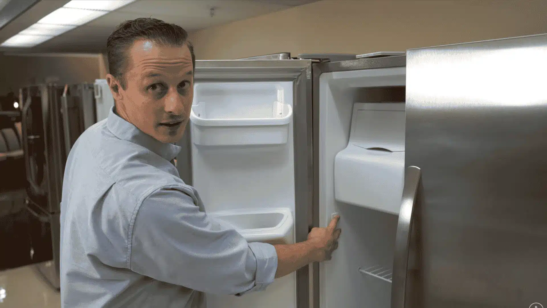BoulevardHome technician testing the refrigerator door switch and interior light for ice maker issues