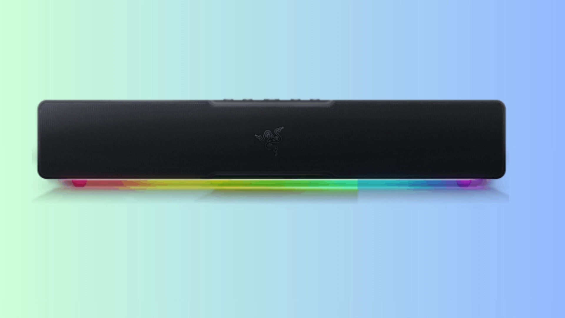 Razer Leviathan V2 X black gaming soundbar with RGB lighting on a soft blue background for desktop audio