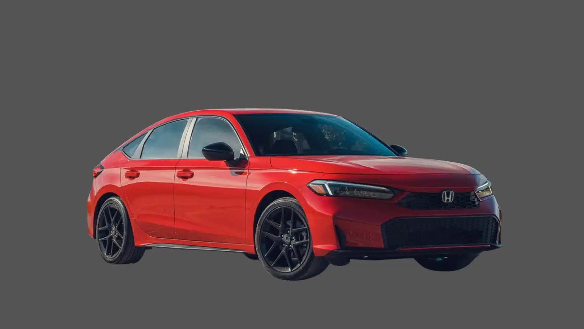 Red Honda Civic sedan shown in angled front view with black alloy wheels on a plain gray background