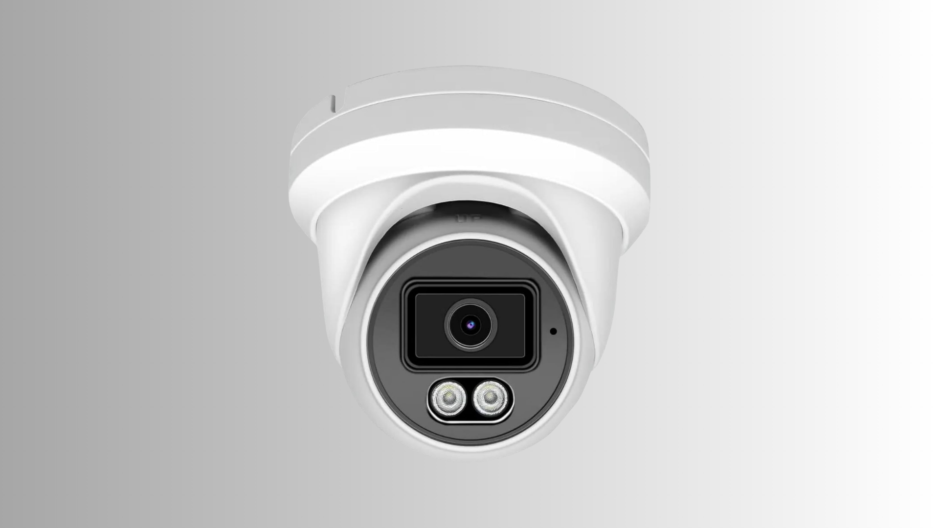 white turret security camera with black lens face and two built in lights