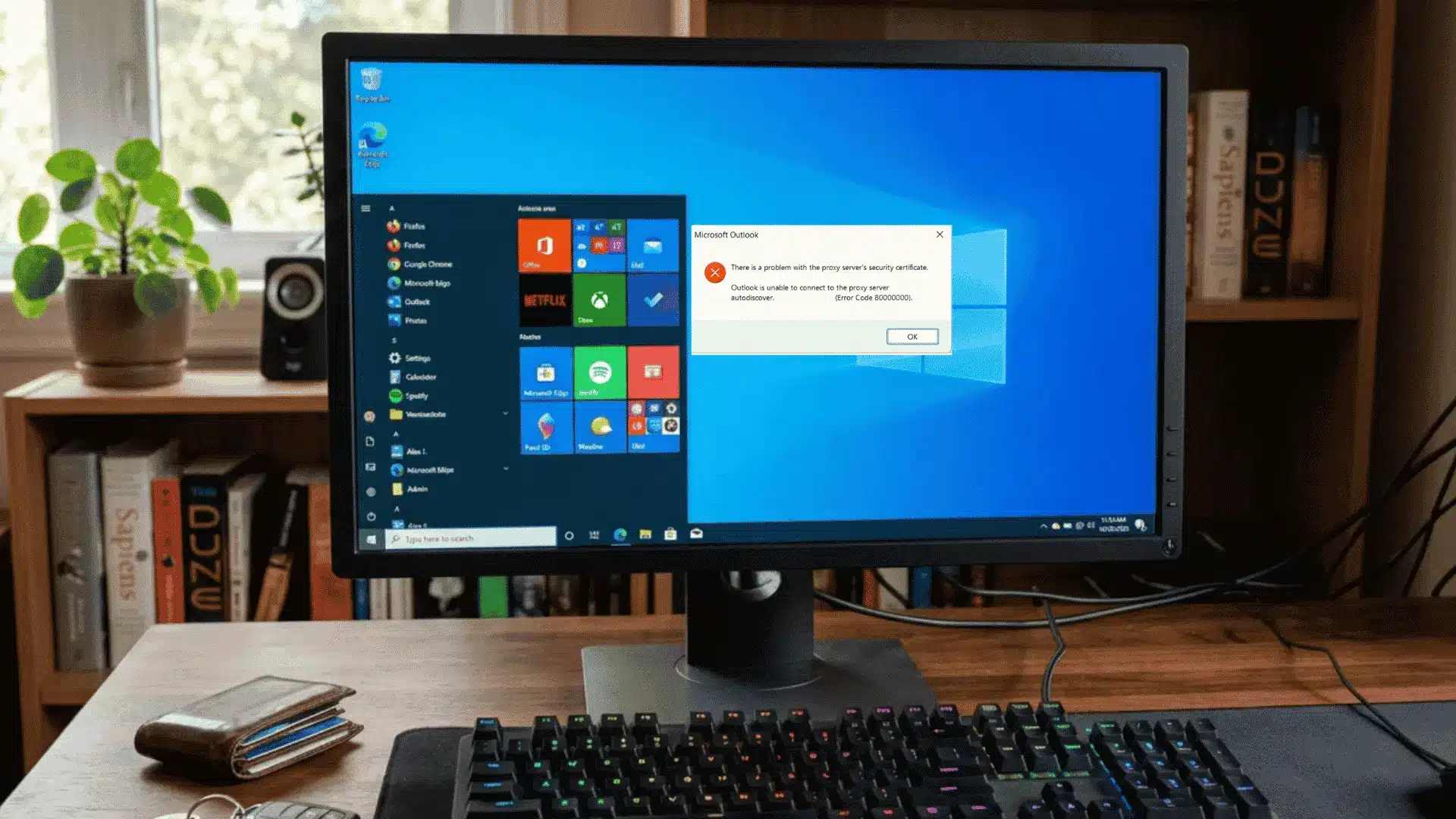 Windows desktop monitor showing a Microsoft Outlook proxy server security certificate error popup in a home office setup