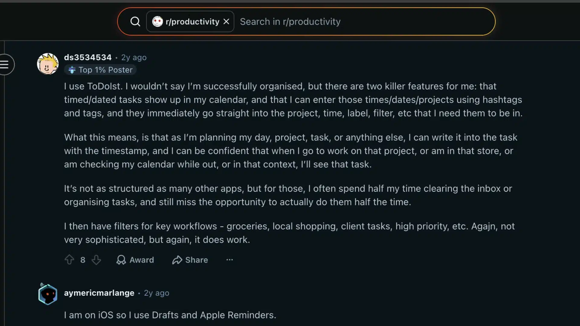 A screenshot of Reddit comments on productivity discussing productivity apps like Todoist and Drafts