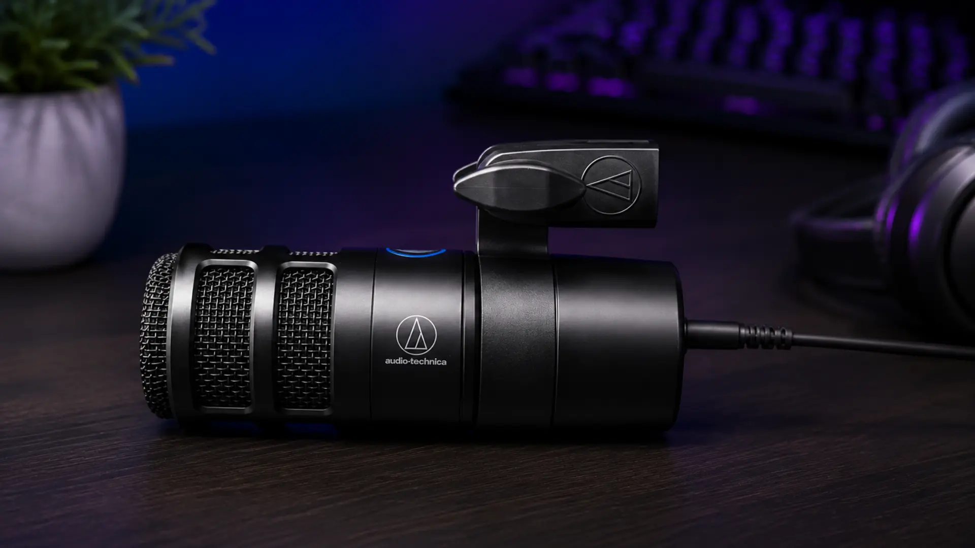 Audio-Technica AT2040USB microphone on a modern gaming desk