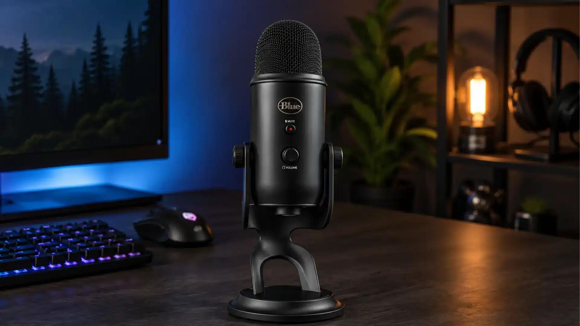Blue Yeti X microphone on a creator desk with headphones and laptop