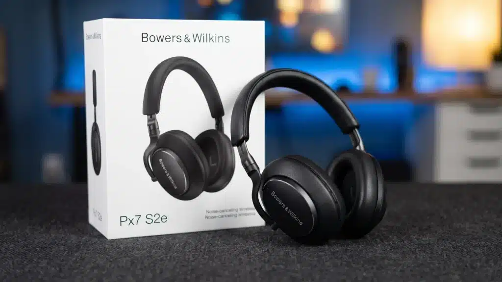 Bowers & Wilkins Px7 S2e headphones displayed with retail box in a premium product showcase