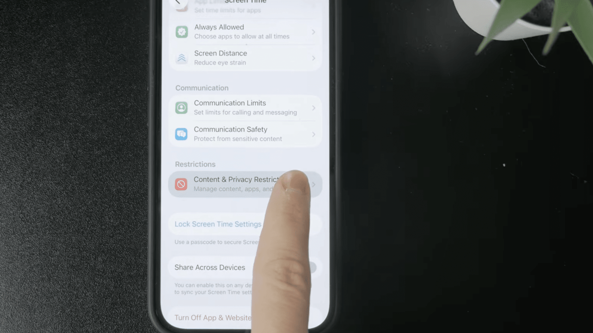 finger opening content and privacy restrictions within iphone screen time settings for device controls