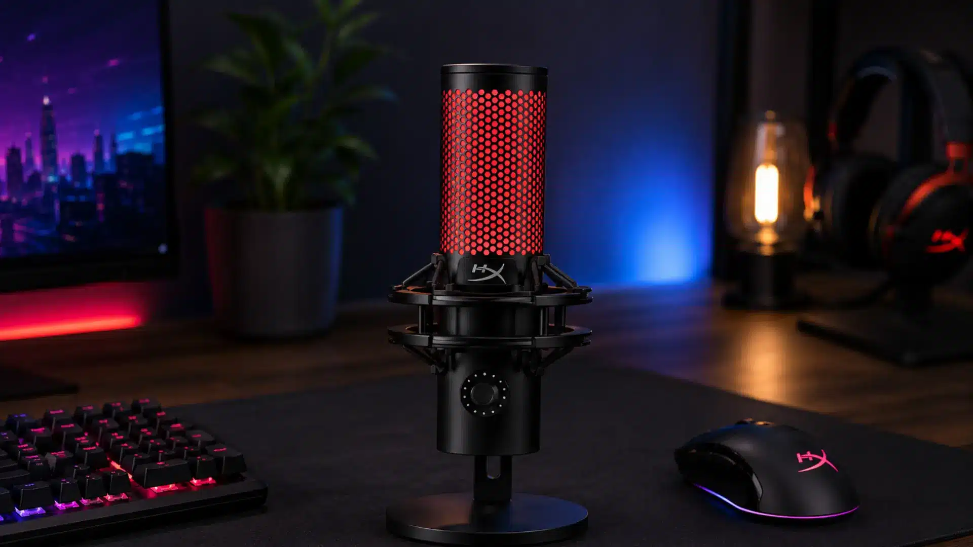 HyperX QuadCast 2 S microphone with RGB lighting on a streamer desk