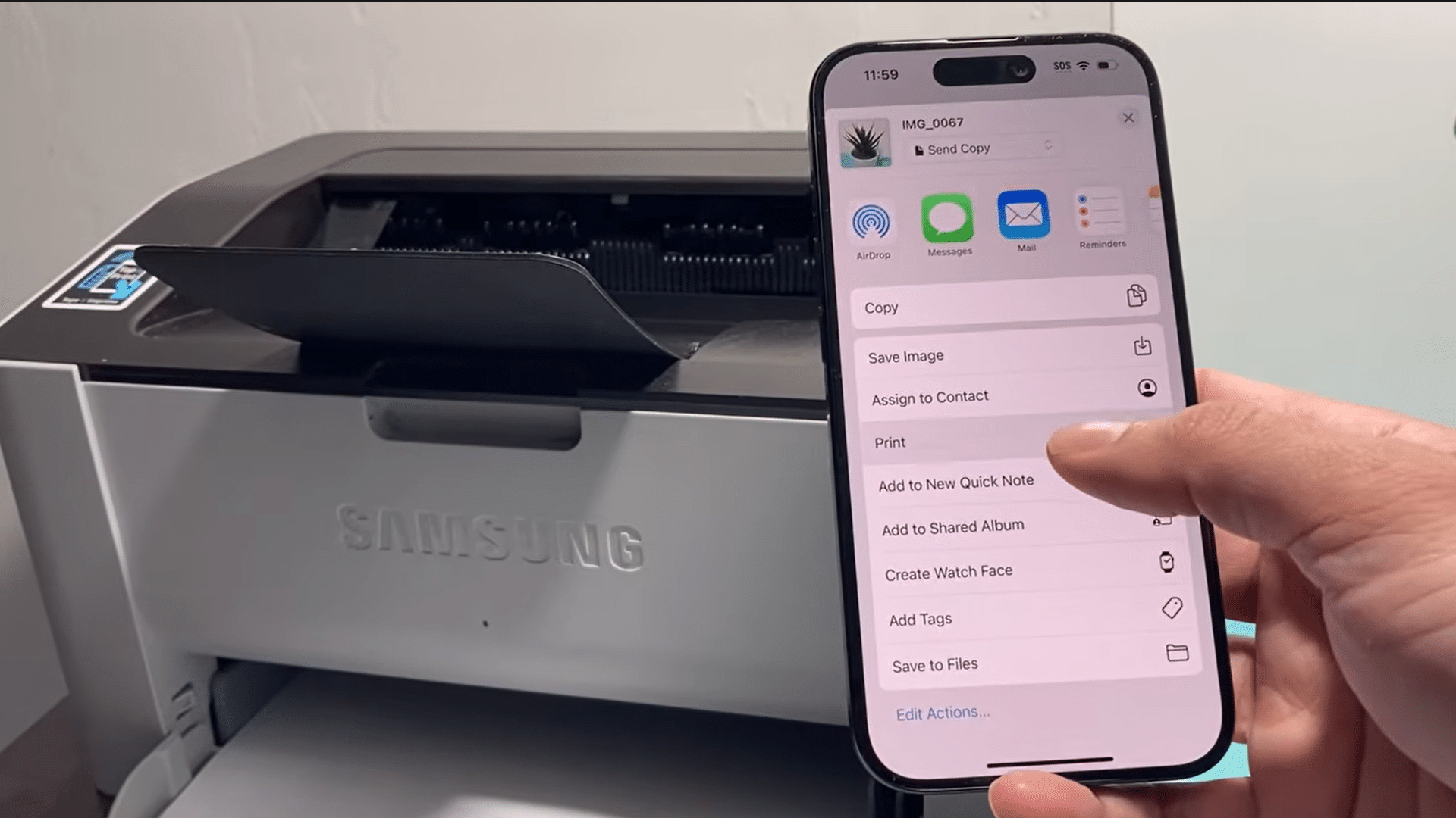iphone share menu showing the print option beside a wireless samsung printer ready for mobile printing setup