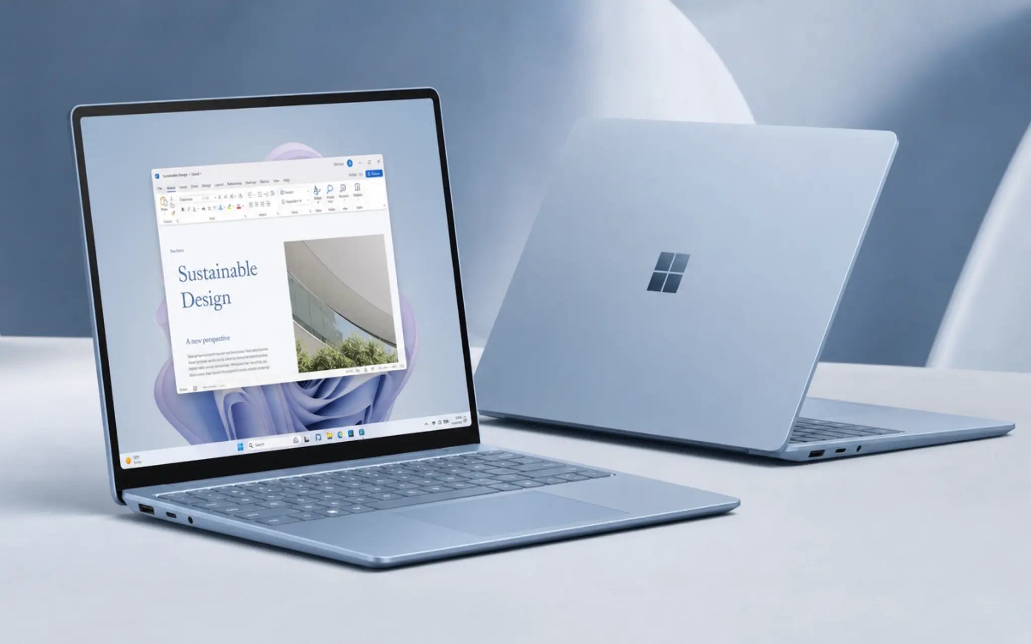 microsoft surface laptop 7th edition in sapphire shown open with a tall writing screen