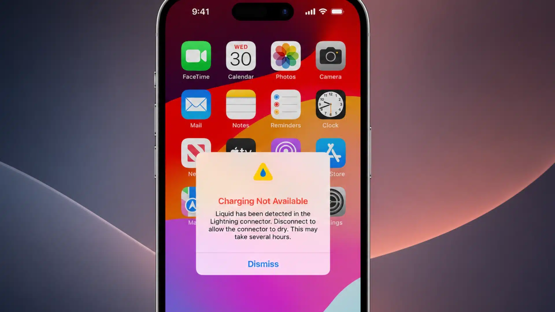 Phone screen showing liquid detected charging warning