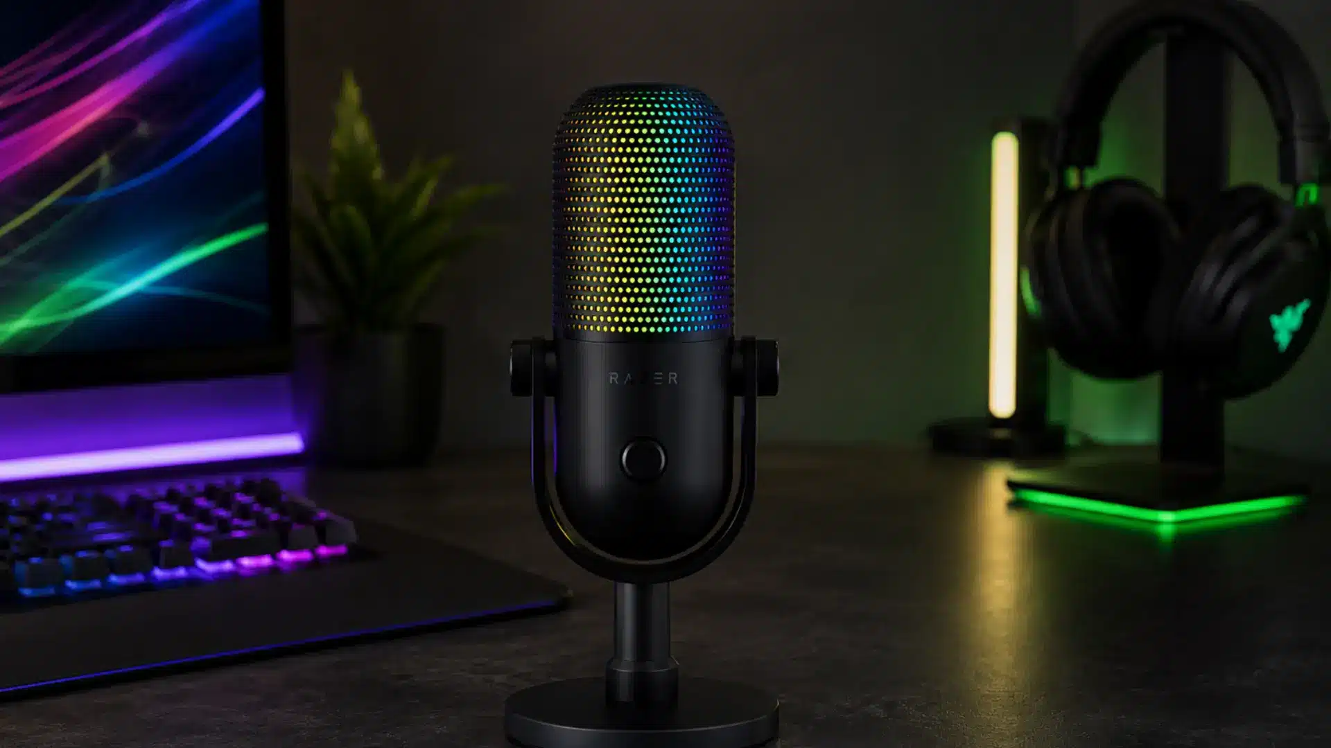 Razer Seiren V3 Chroma microphone with RGB lighting on a gaming desk