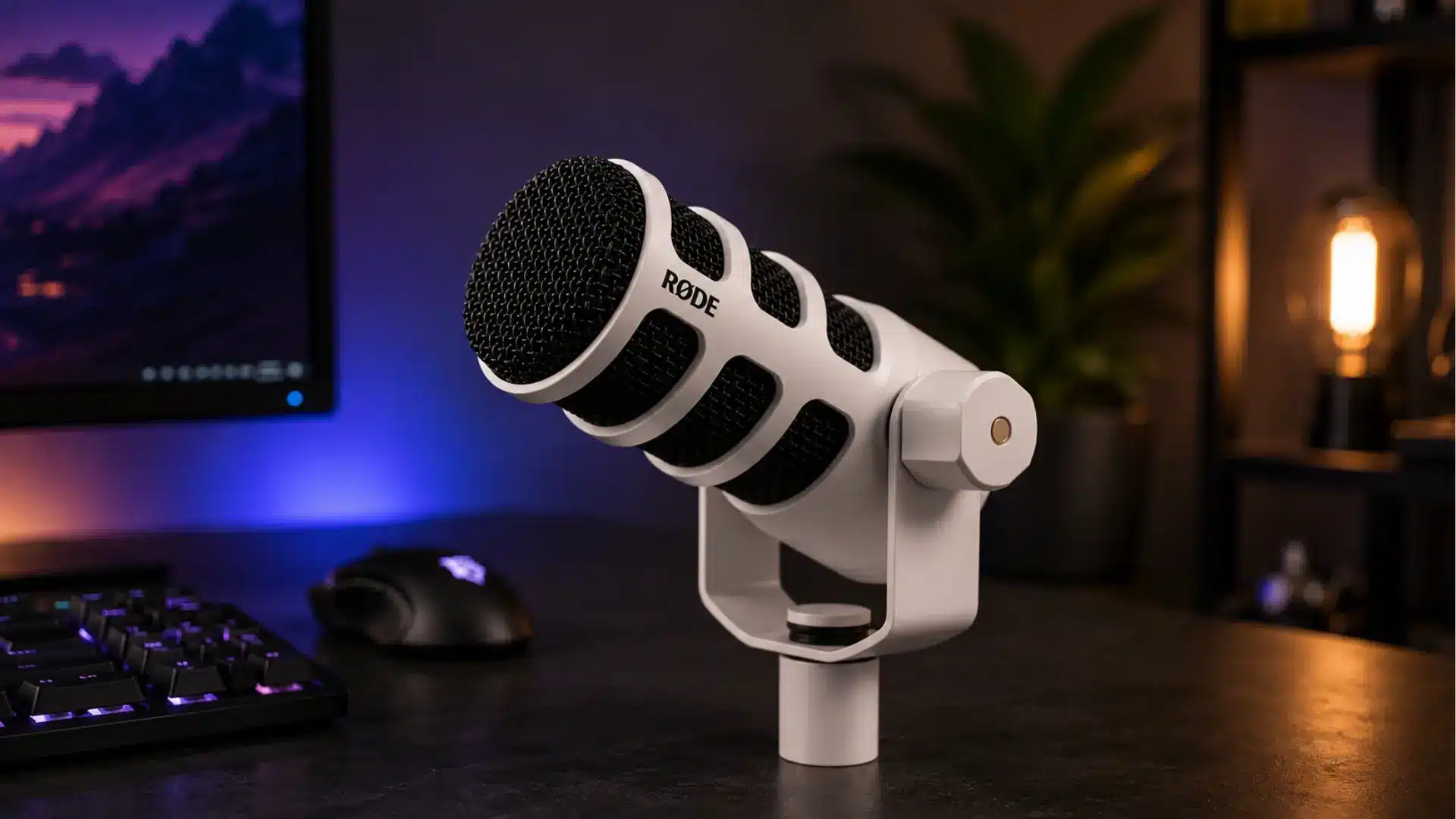 Rode PodMic USB microphone in a warm gaming and podcast setup