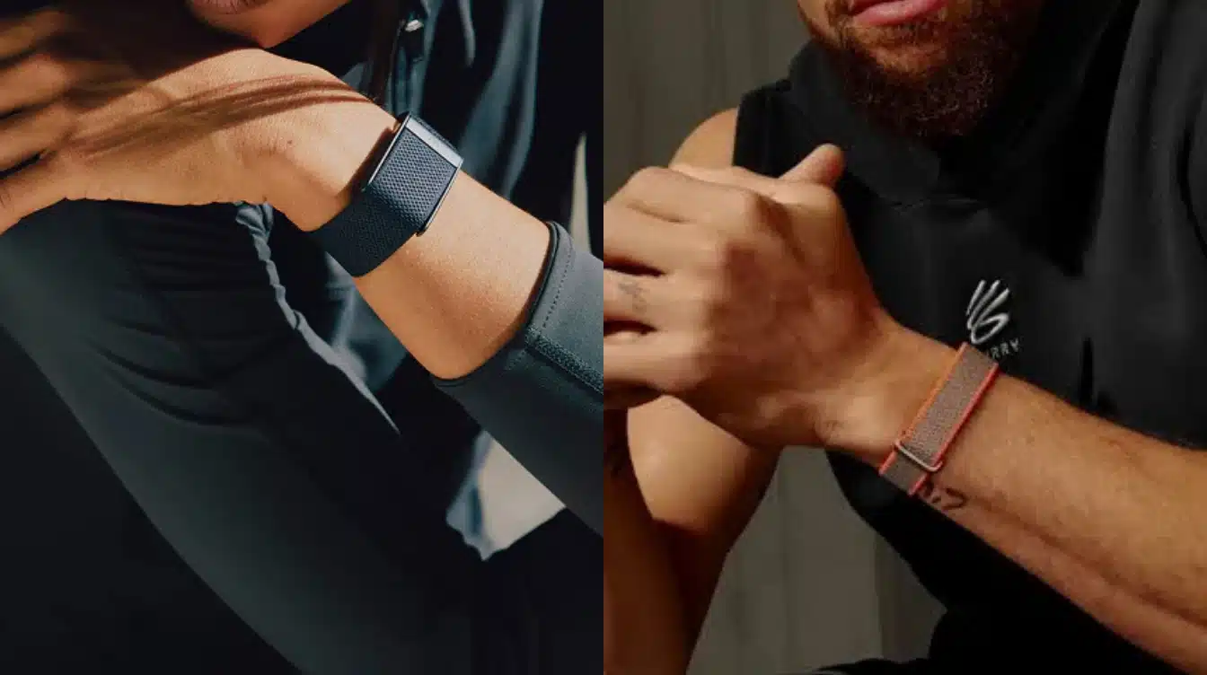 two people wearing different fitness tracker bands comparing fitbit and whoop devices during workout