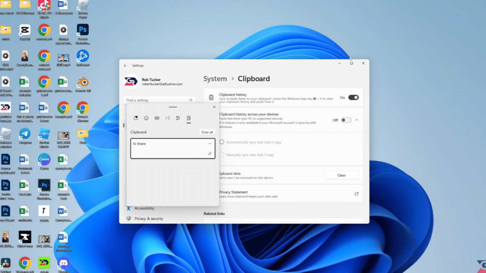 windows 11 clipboard settings with clipboard history enabled and sync options displayed in the system menu