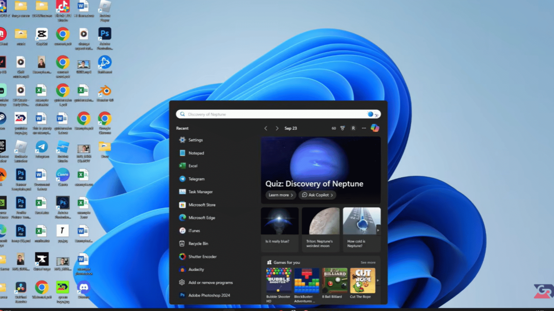 windows 11 desktop with the start menu open showing search results and installed apps on the home screen