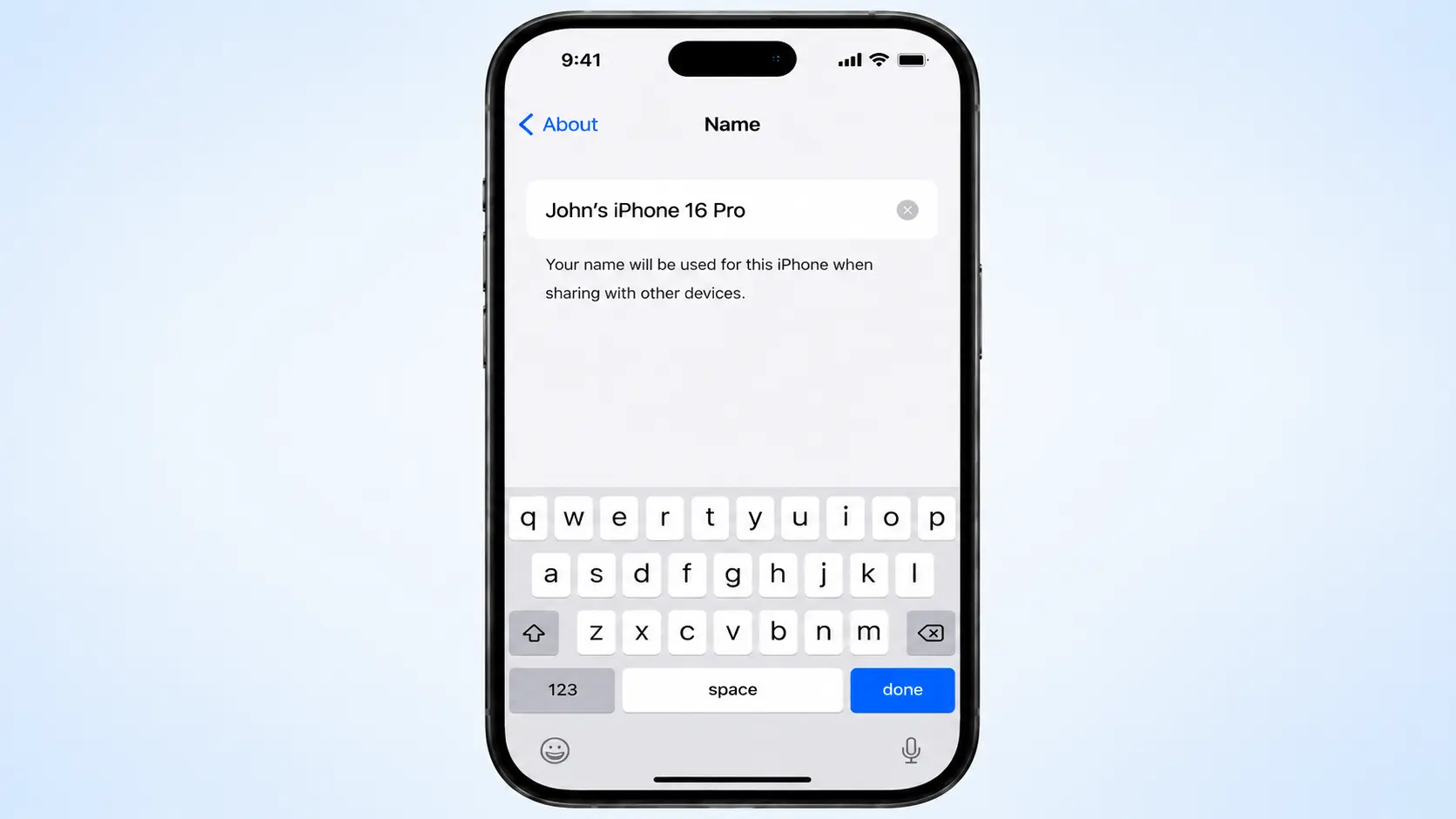 iphone name field showing a new device name being typed with keyboard open