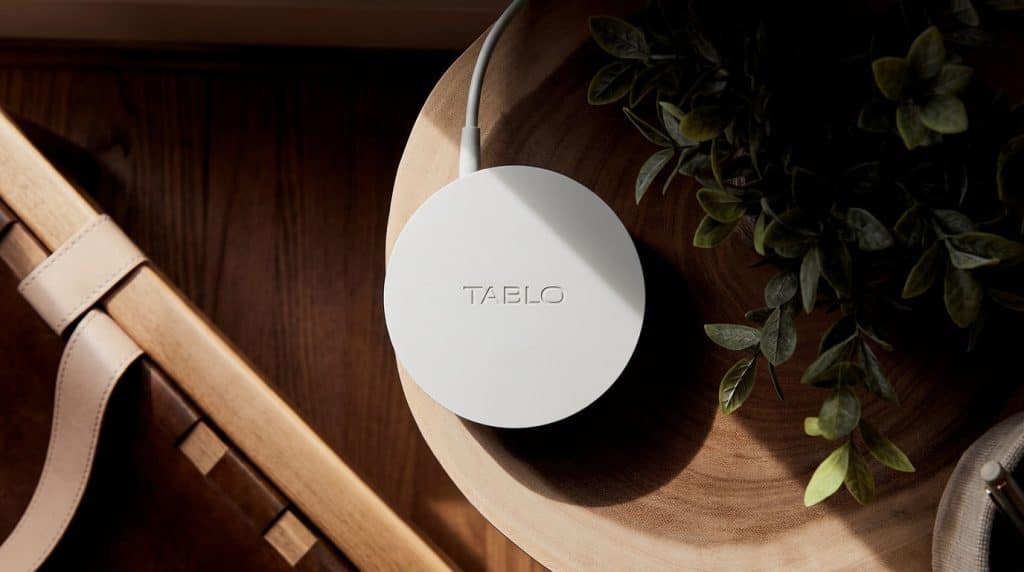 tablo tv device placed on a table showing its compact wireless tv streaming design