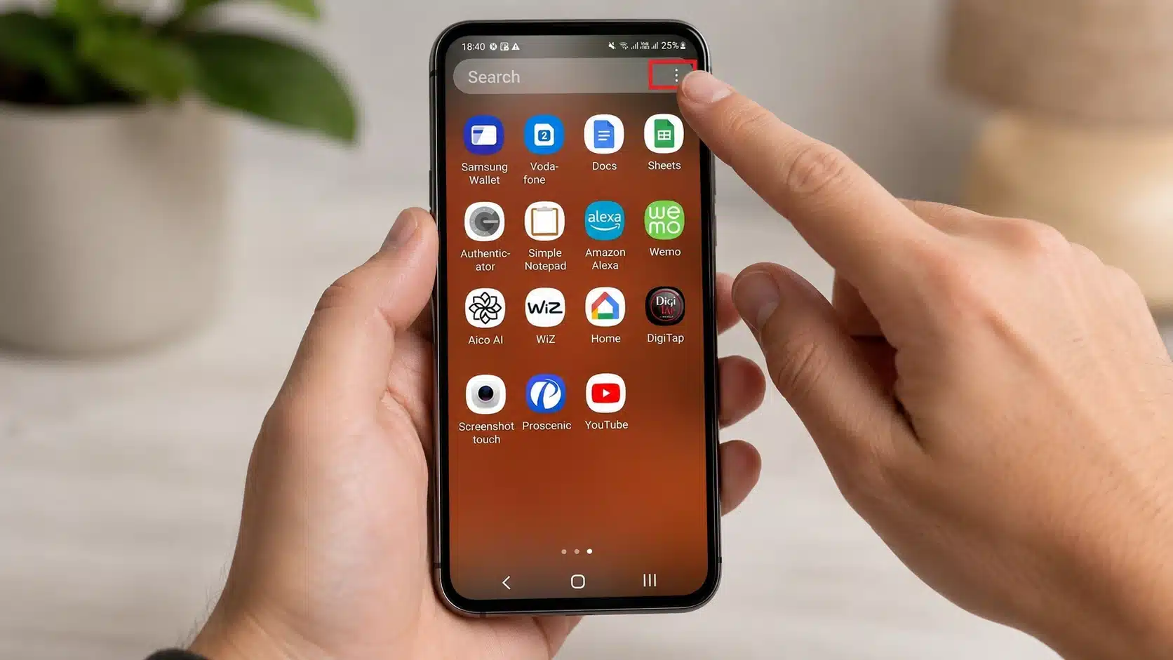Tapping the three-dot menu icon in the Android app drawer to access hidden apps settings